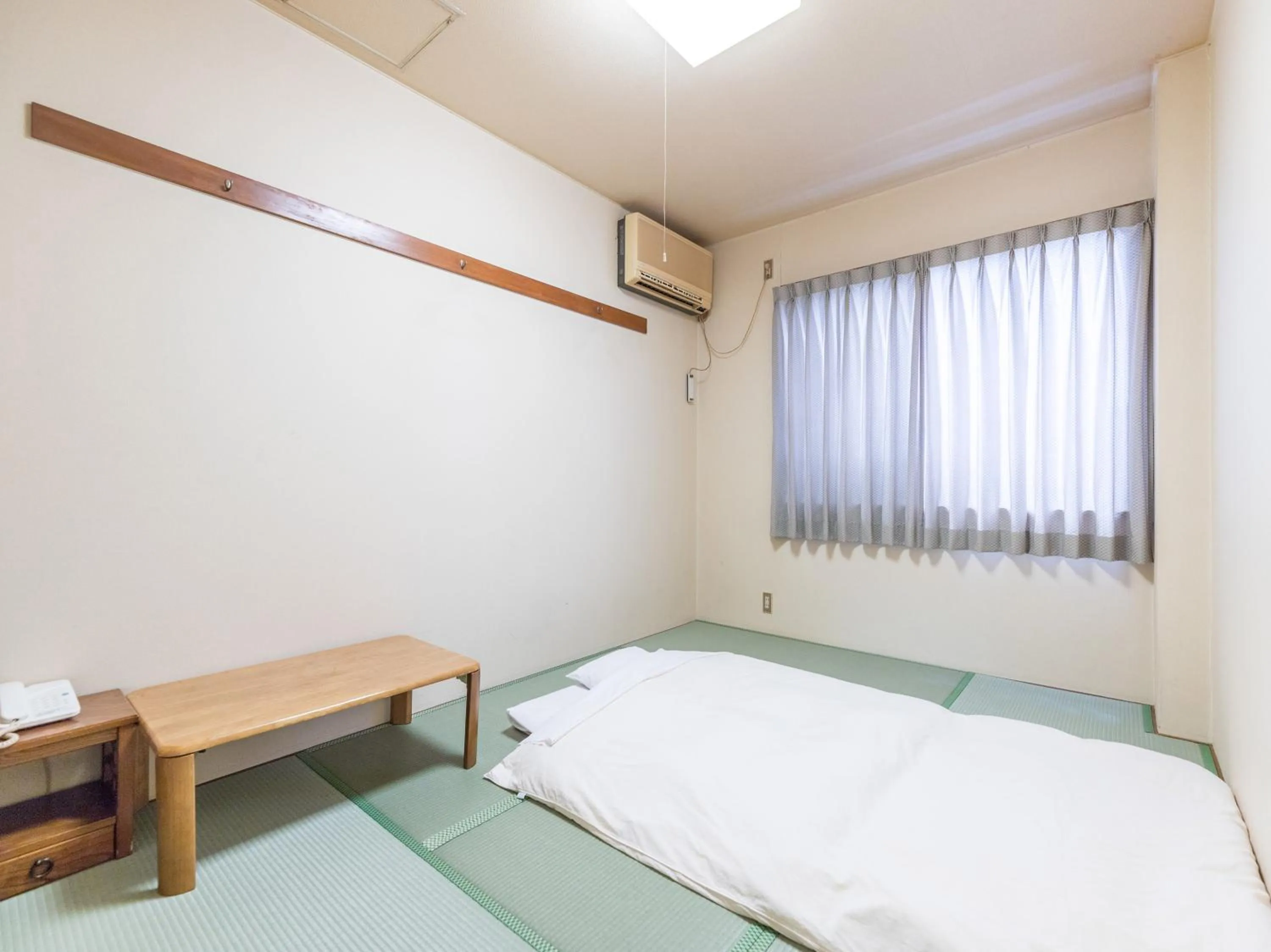Bed in Hotel Isesaki East