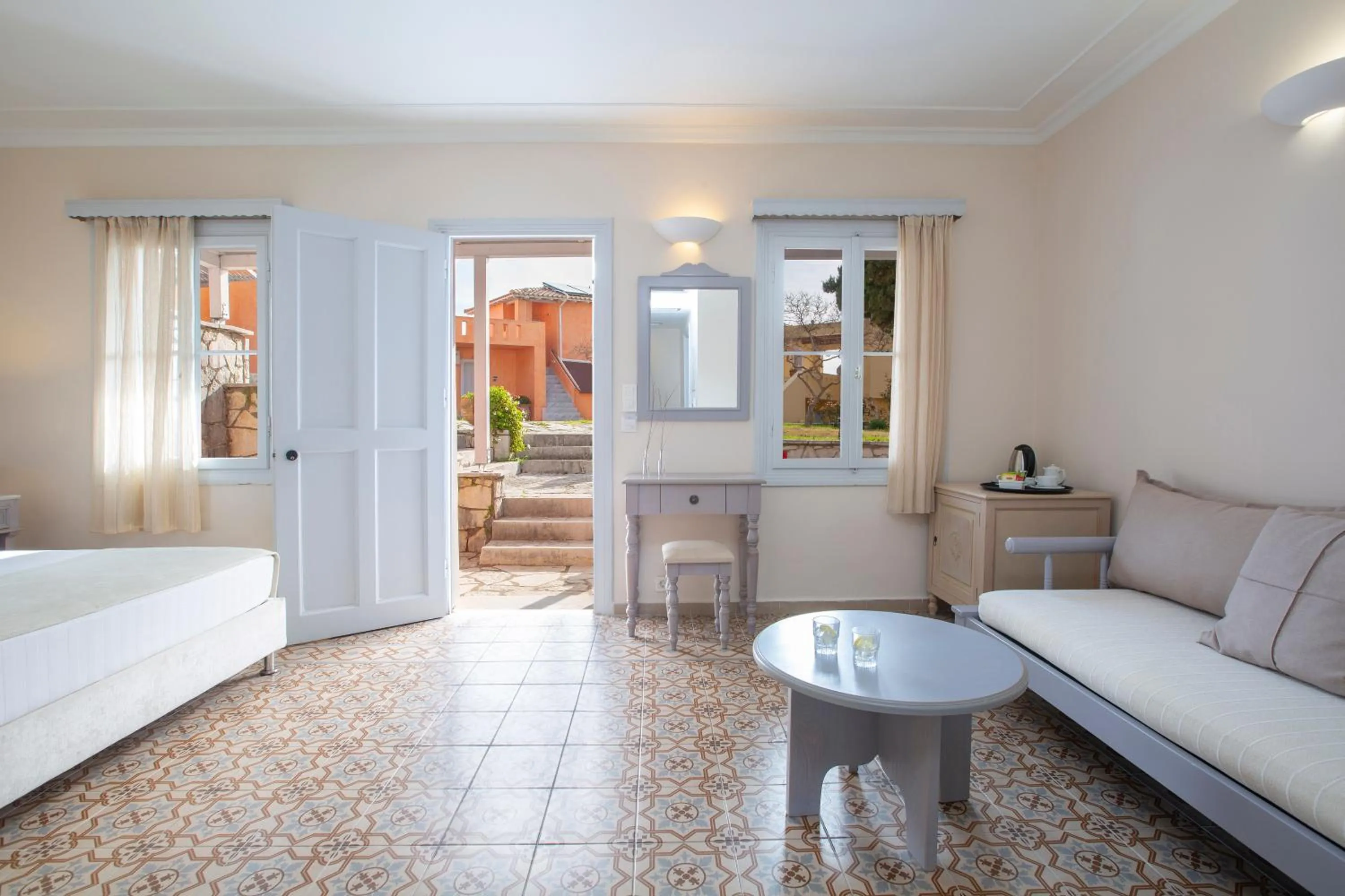 Seating area, Bed in Red Tower Hotel
