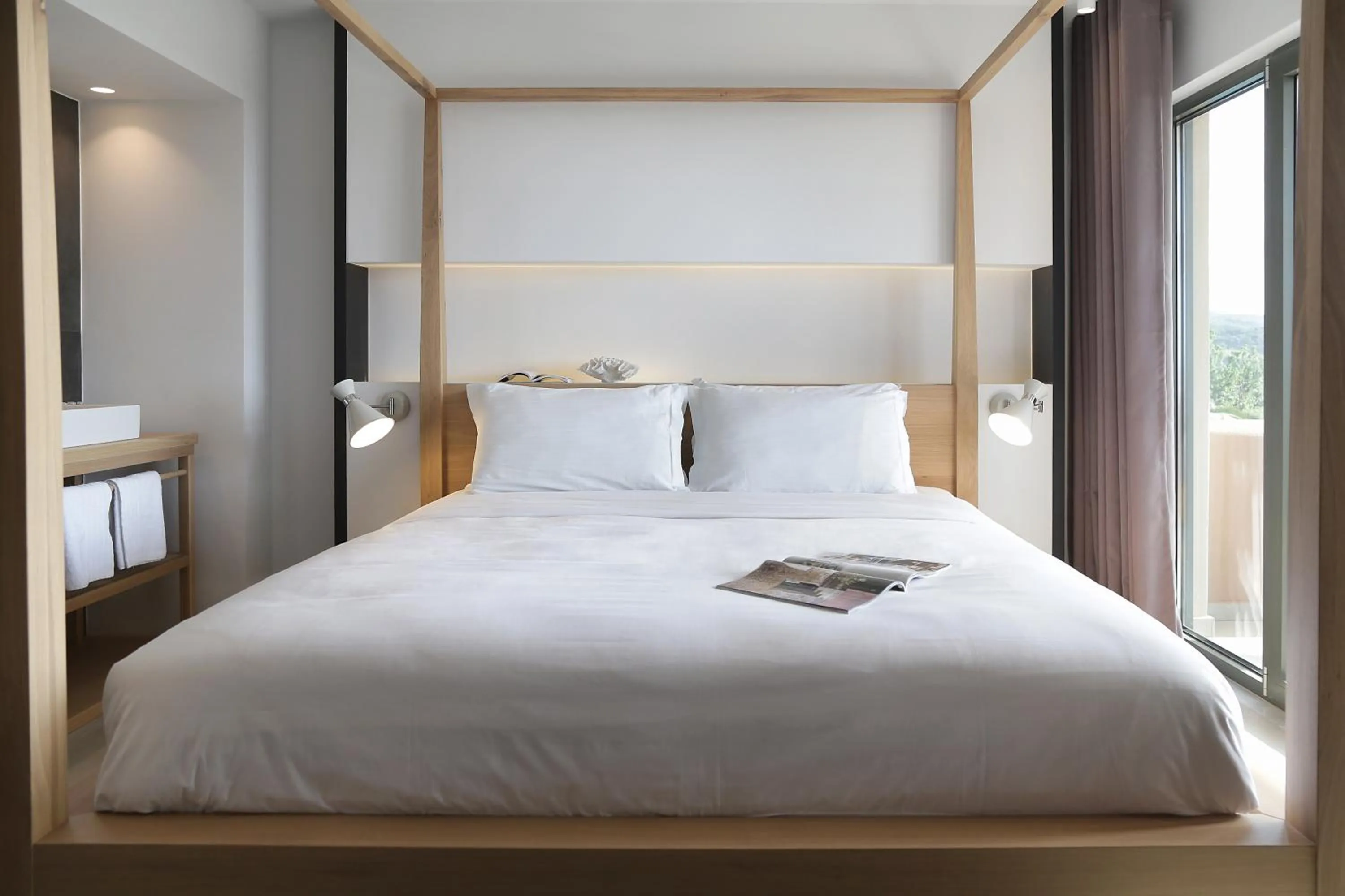 Bed in Lena Mare Boutique Hotel