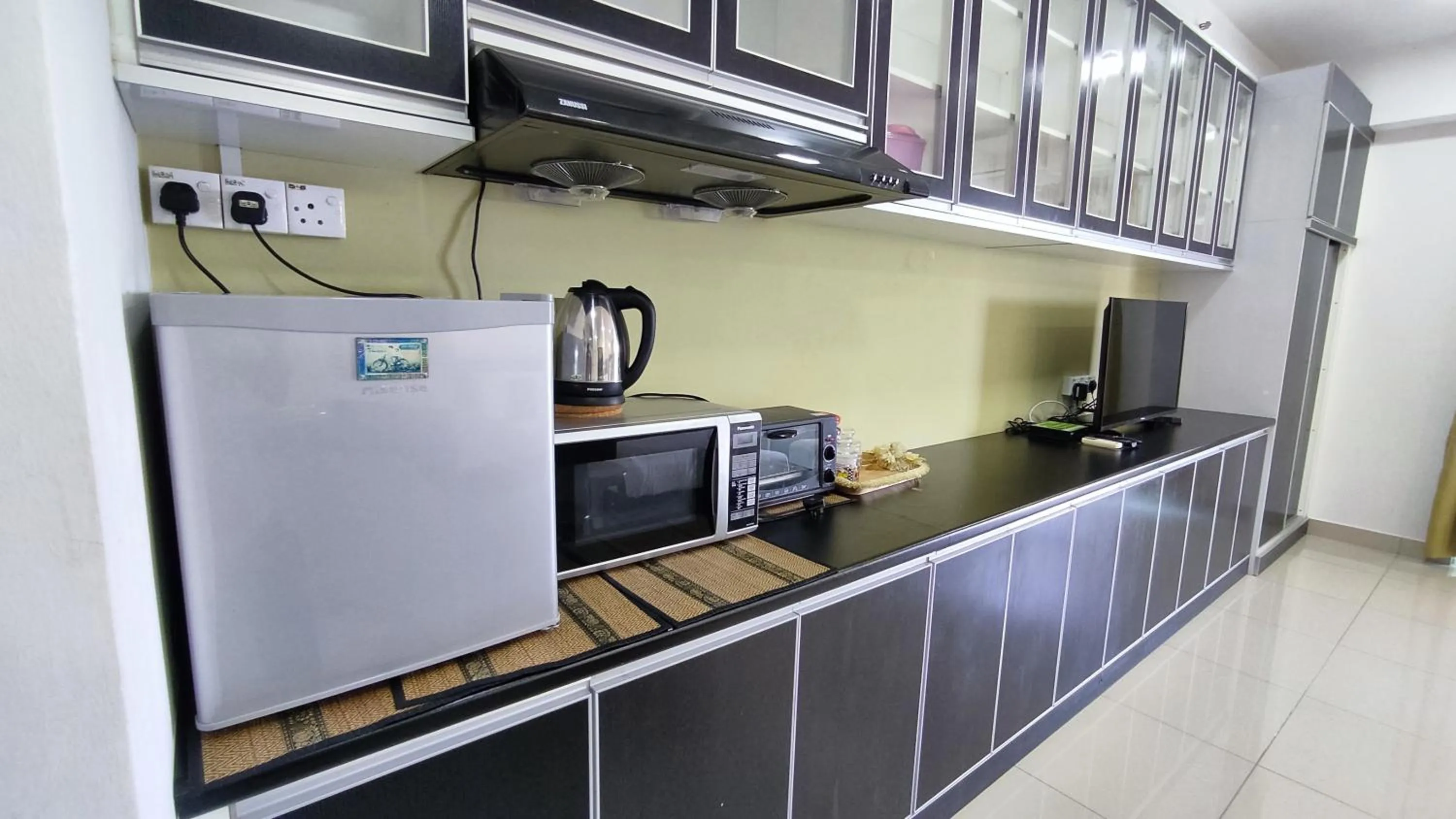 Kitchen or kitchenette in Cahaya Qaira Homestay @ D'Perdana Kota Bharu