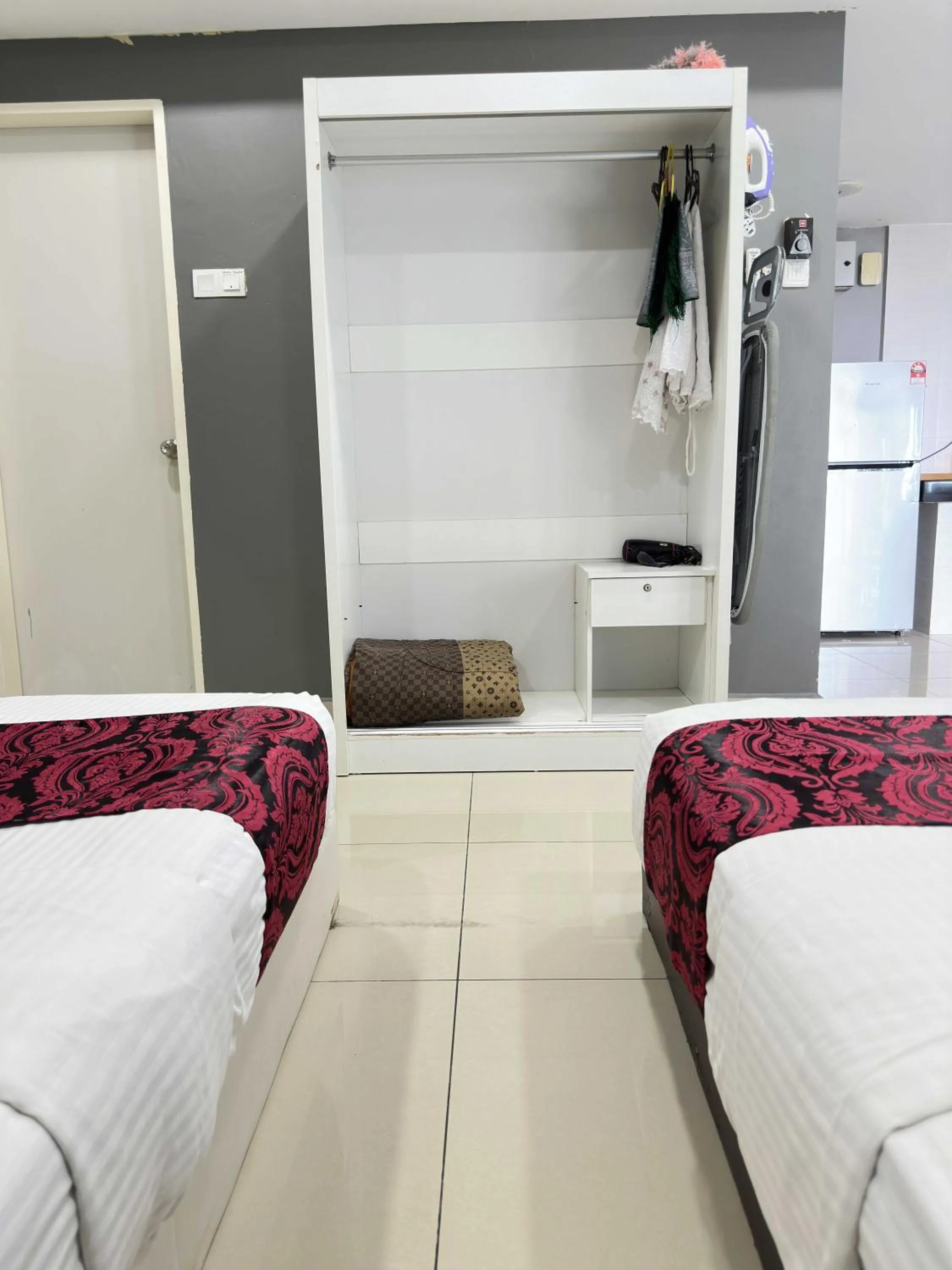 wardrobe, Bed in Cahaya Qaira Homestay @ D'Perdana Kota Bharu