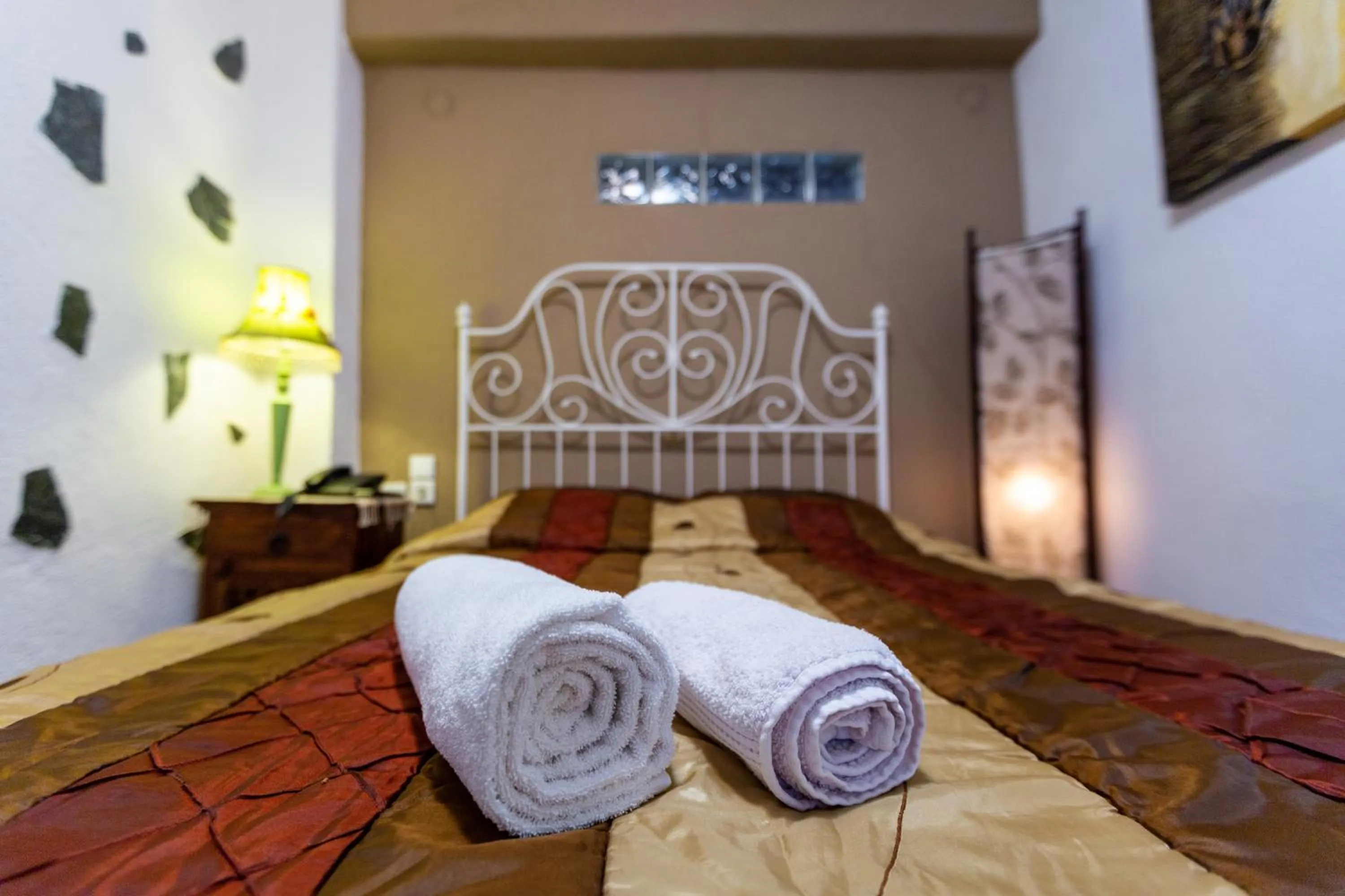 Bed in La Moara Boutique Hotel