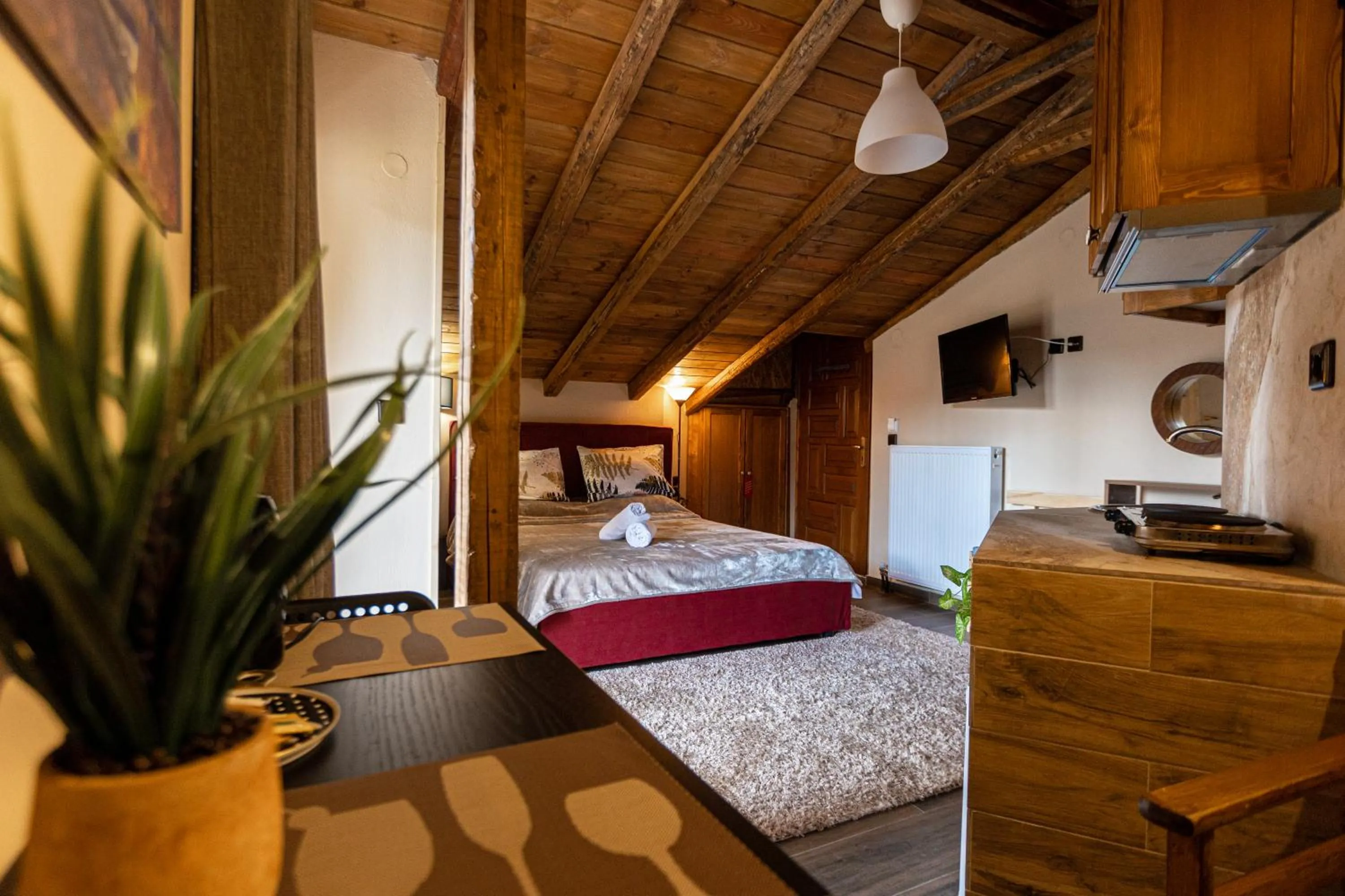 Bed in La Moara Boutique Hotel