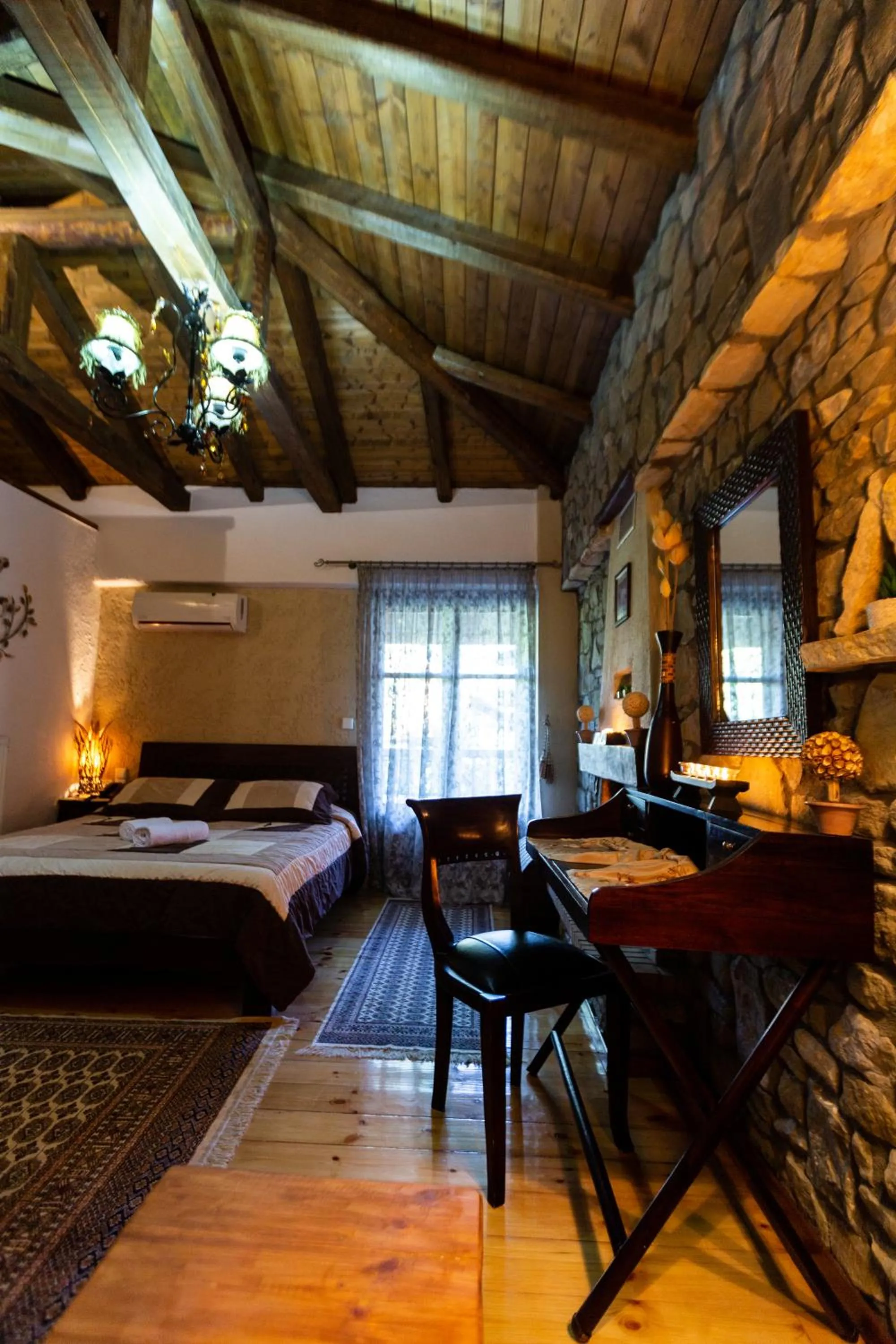 Bed in La Moara Boutique Hotel