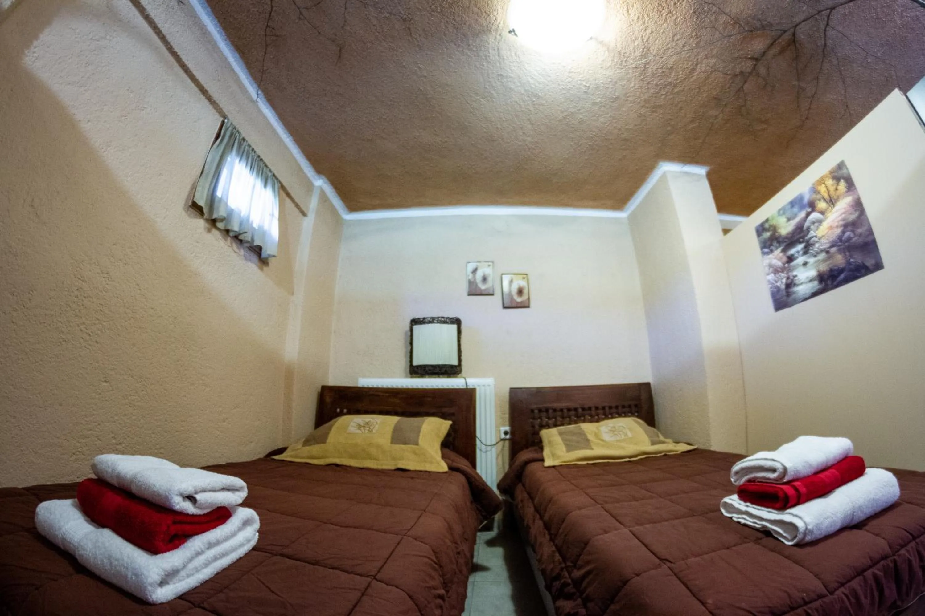 Bed in La Moara Boutique Hotel