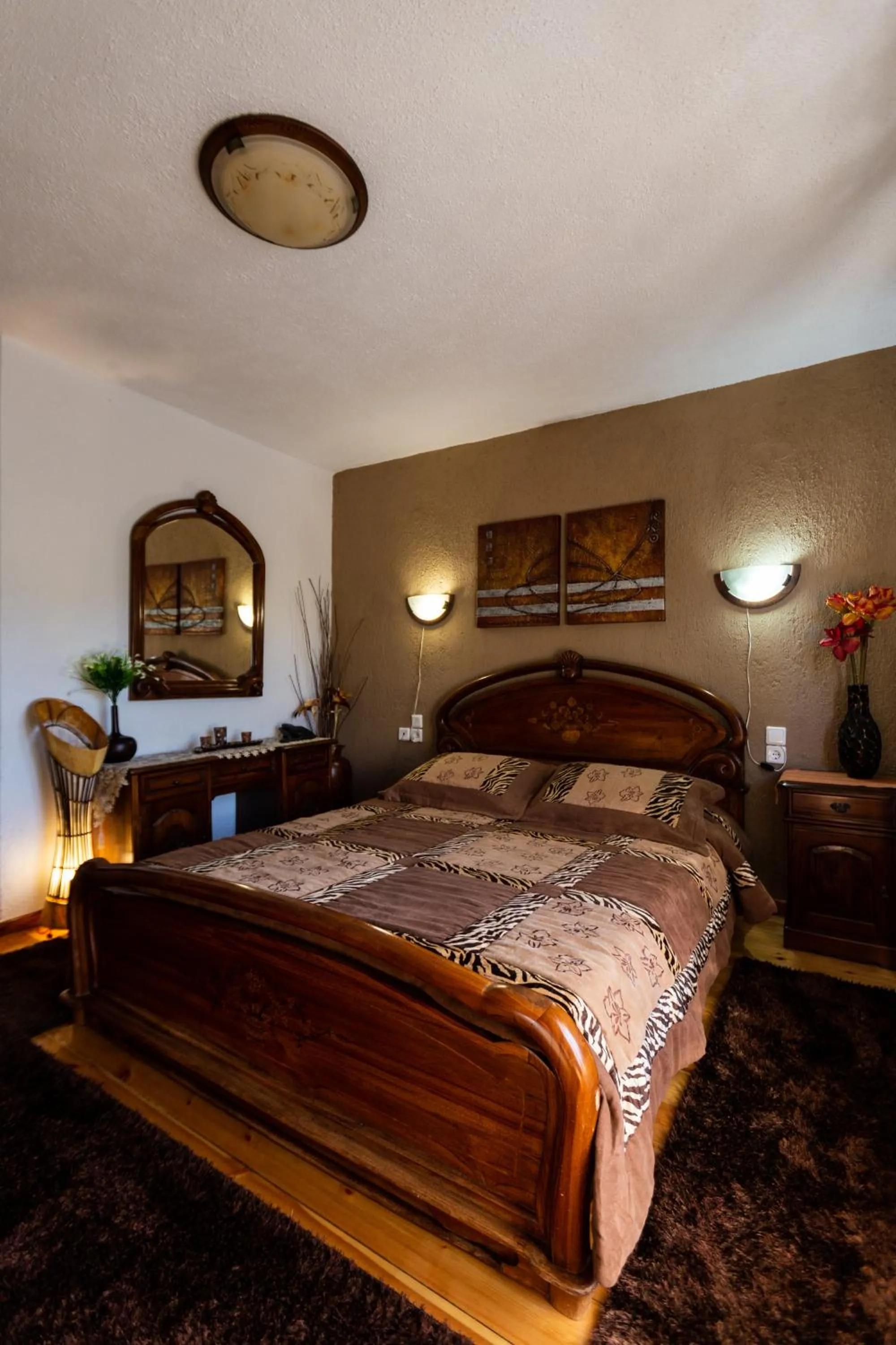 Bed in La Moara Boutique Hotel