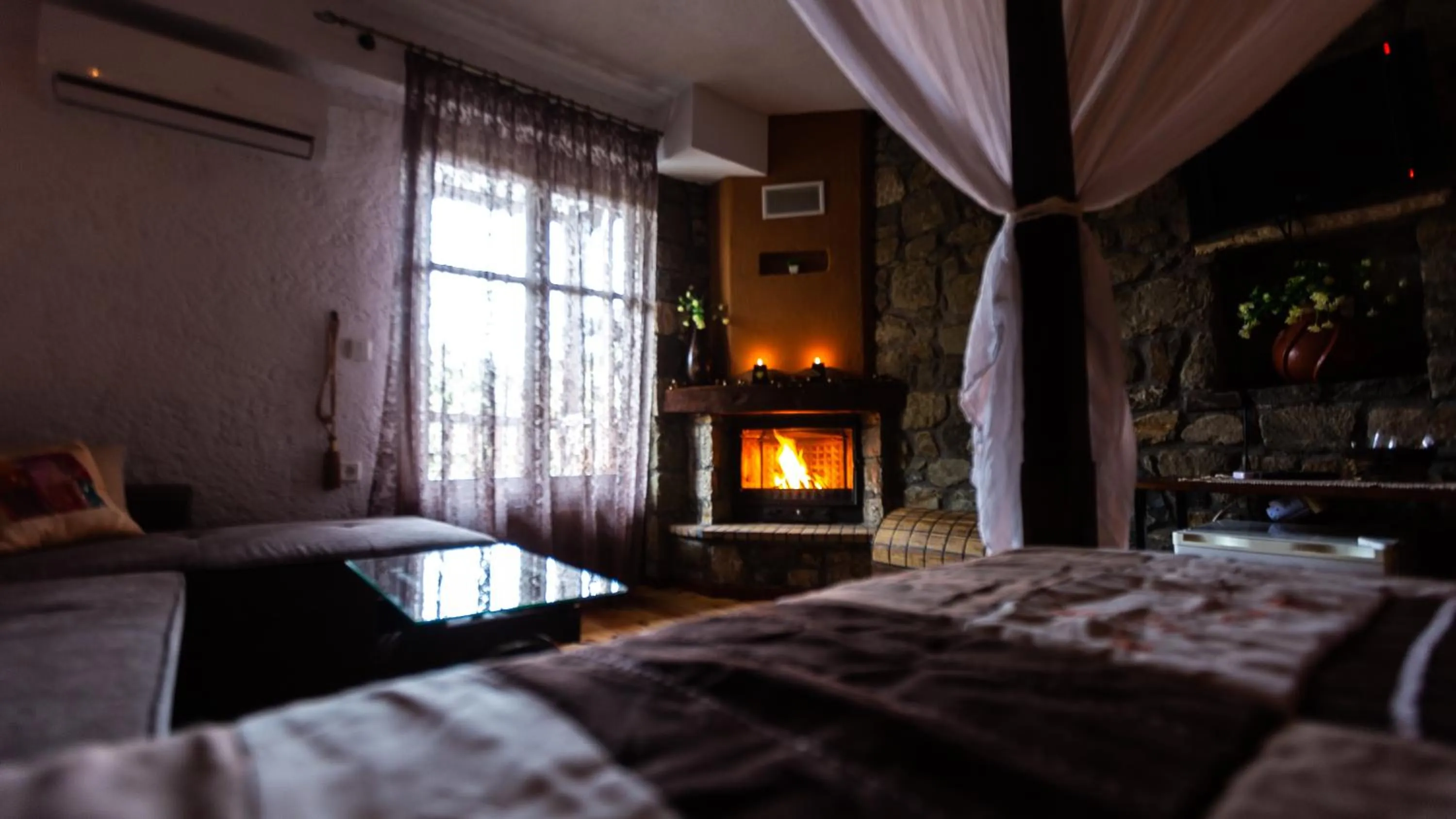 Bed in La Moara Boutique Hotel