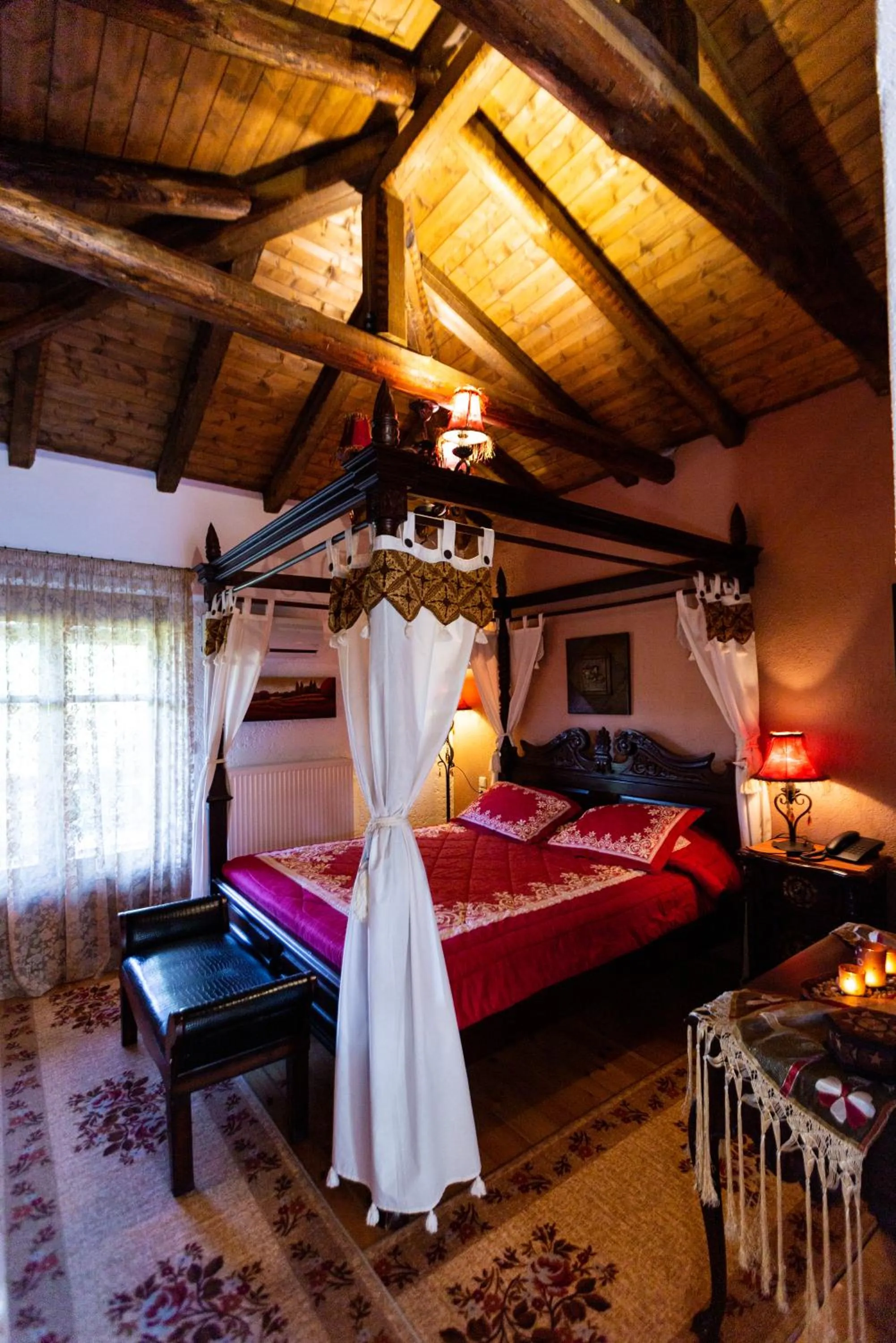 Bed in La Moara Boutique Hotel