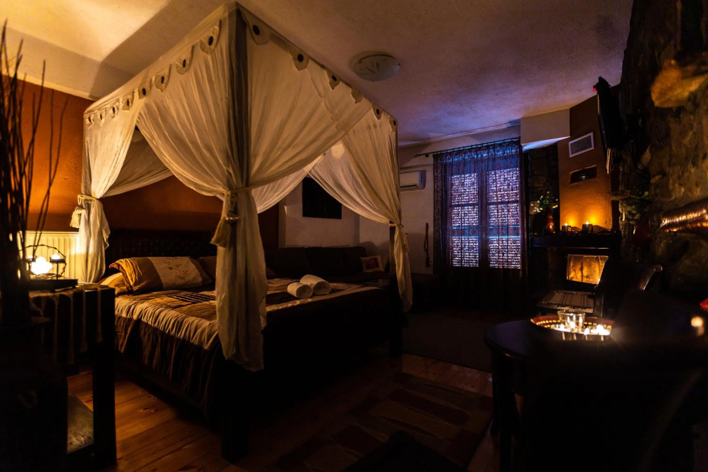 Bed in La Moara Boutique Hotel
