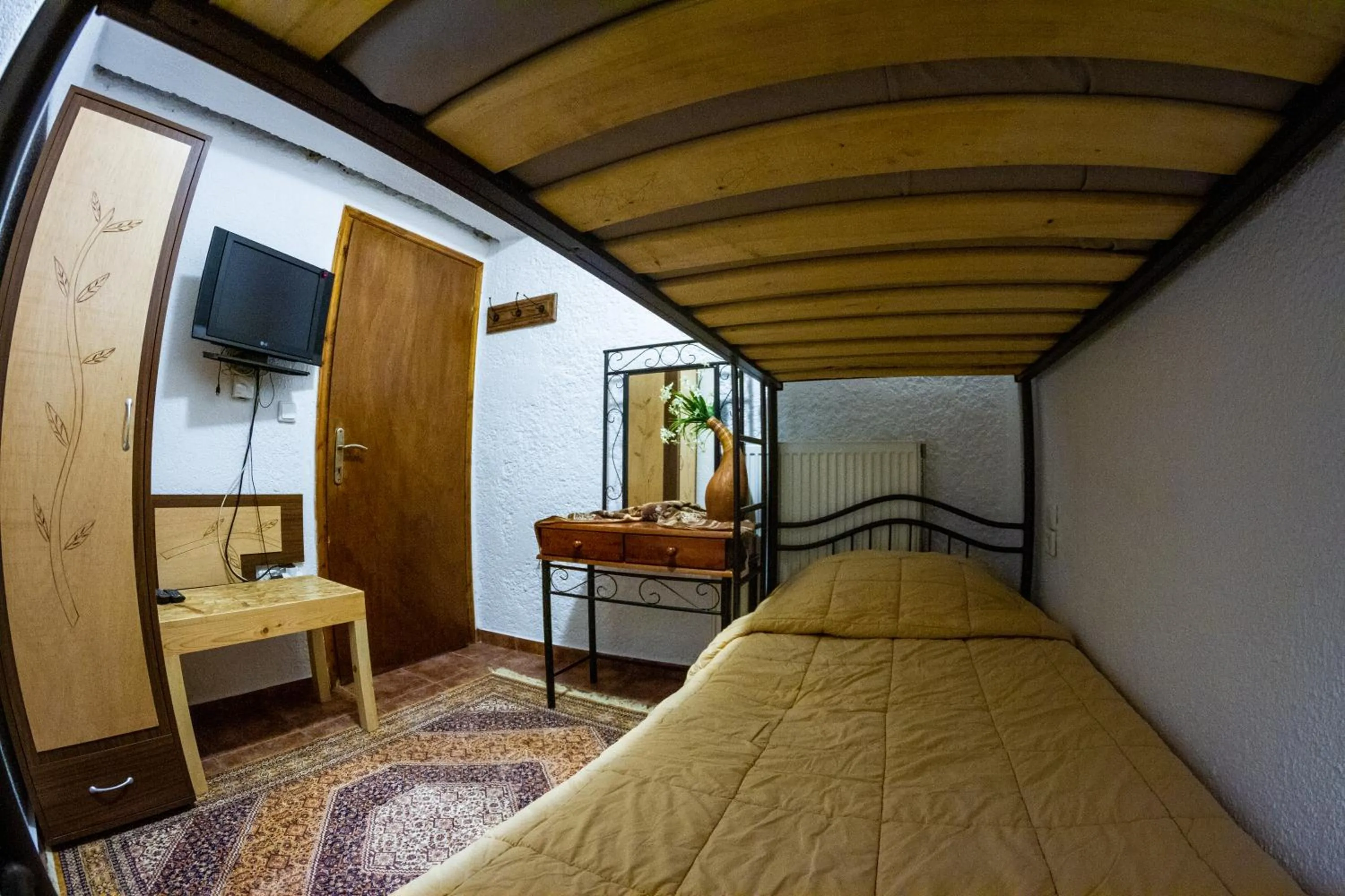 Bed in La Moara Boutique Hotel