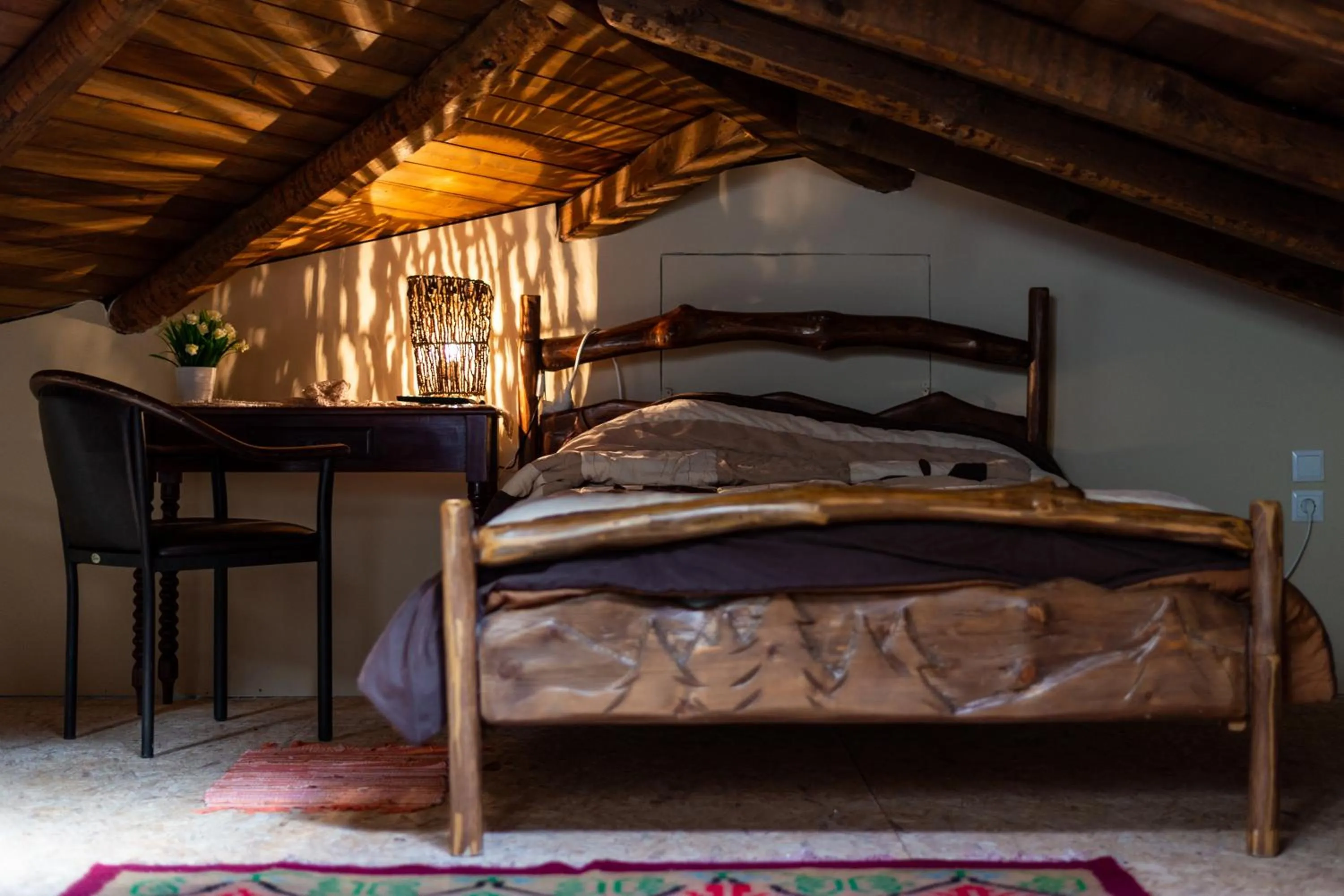 Bed in La Moara Boutique Hotel