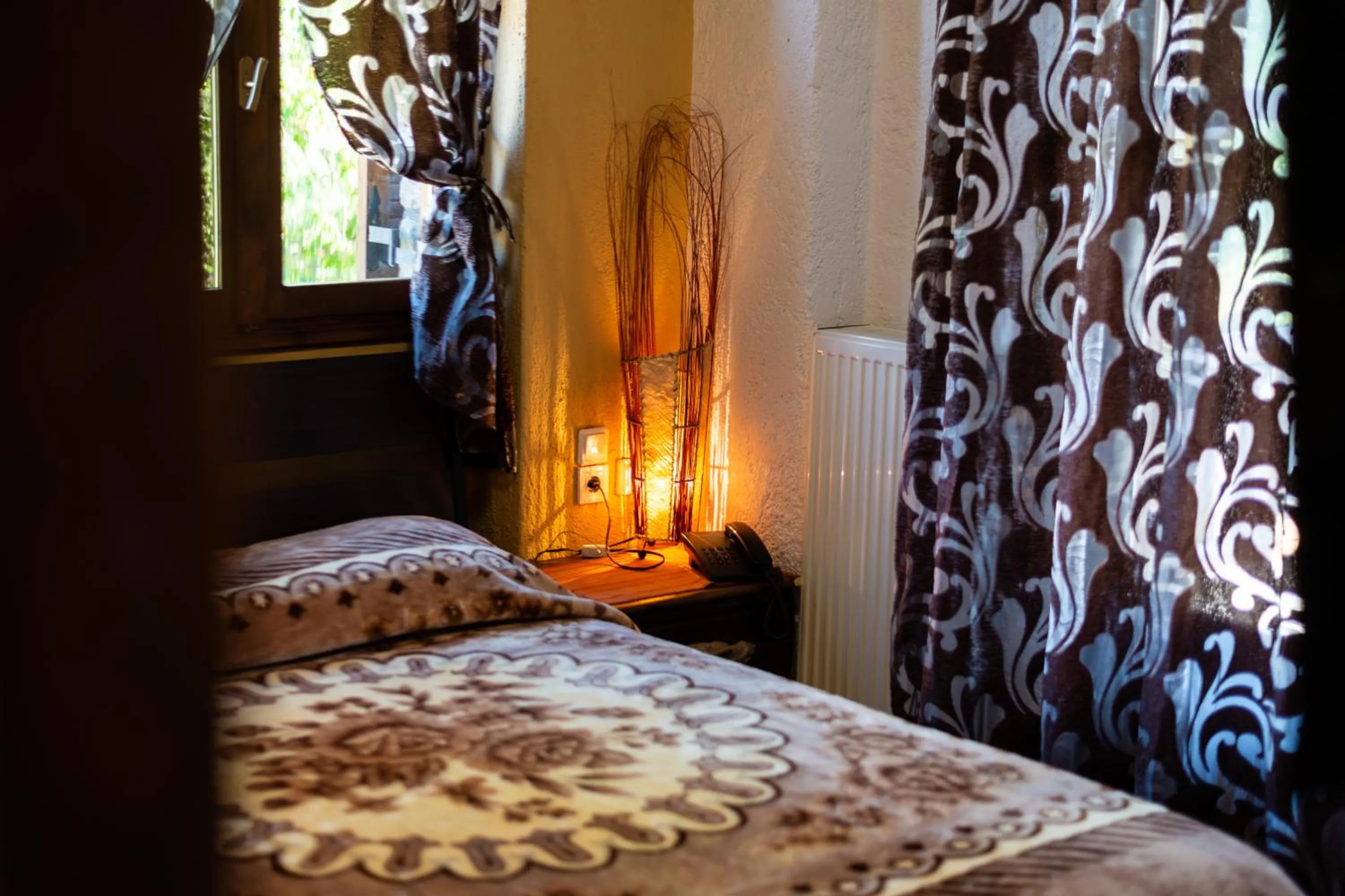 Bed in La Moara Boutique Hotel