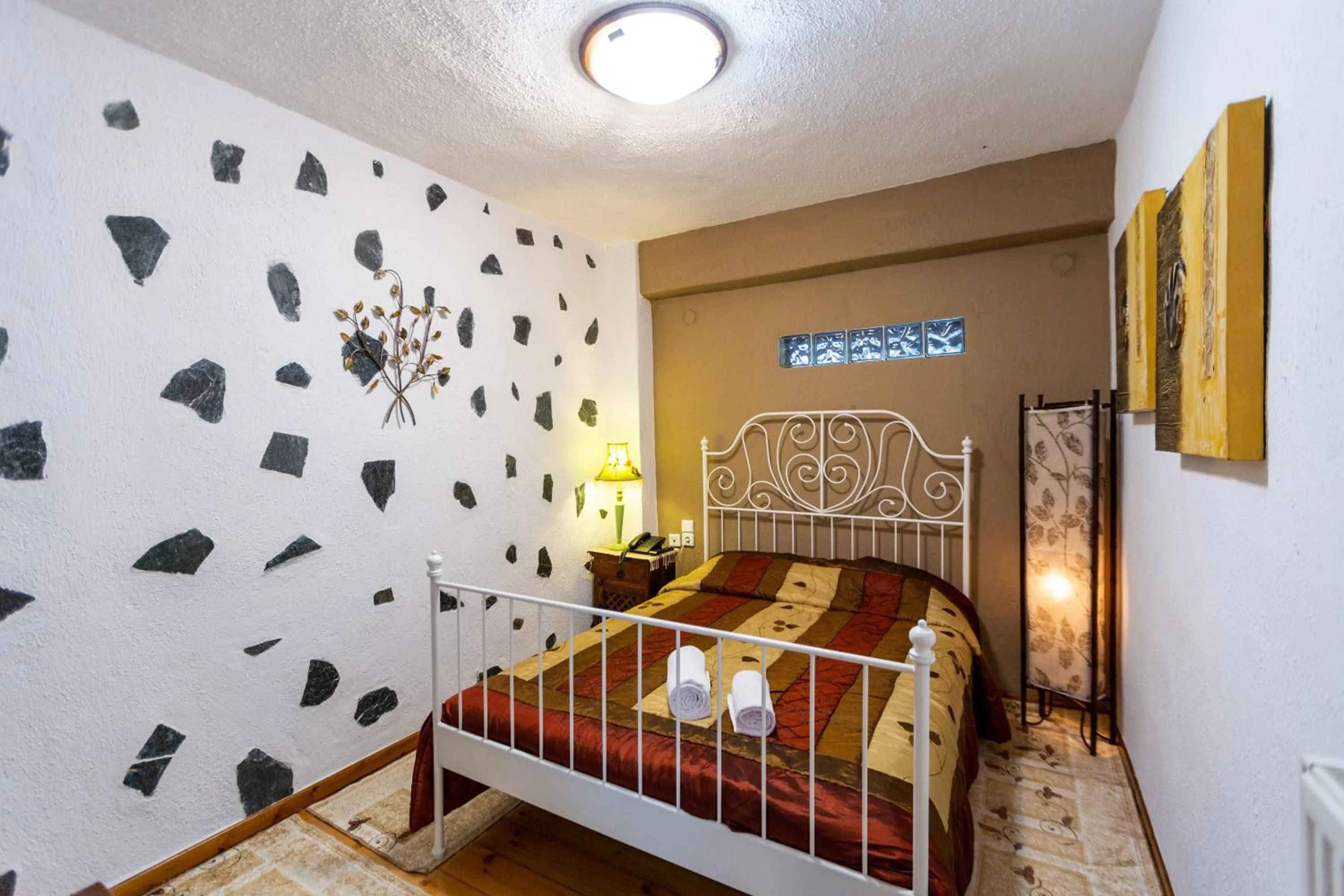 Bed in La Moara Boutique Hotel