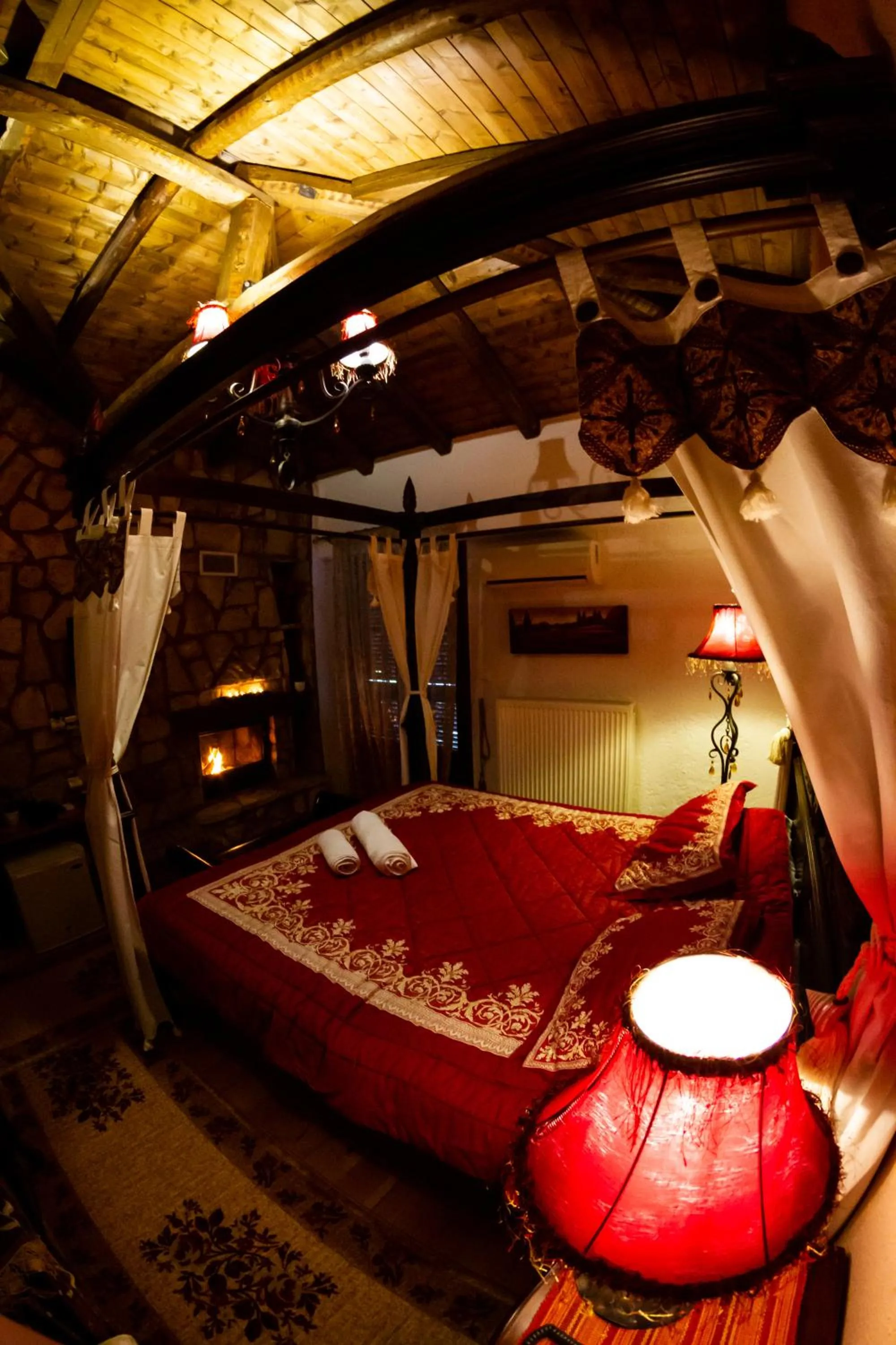 Bed in La Moara Boutique Hotel