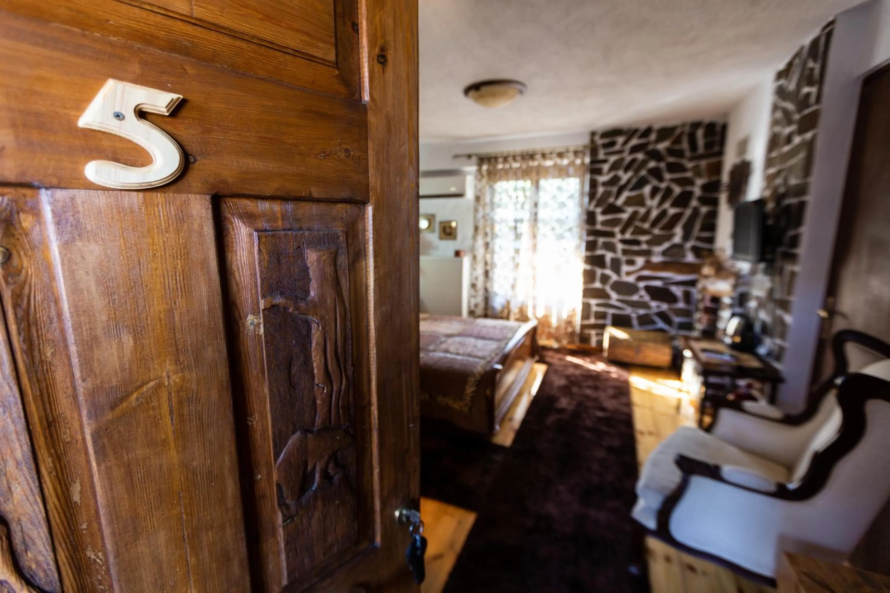 Bed in La Moara Boutique Hotel