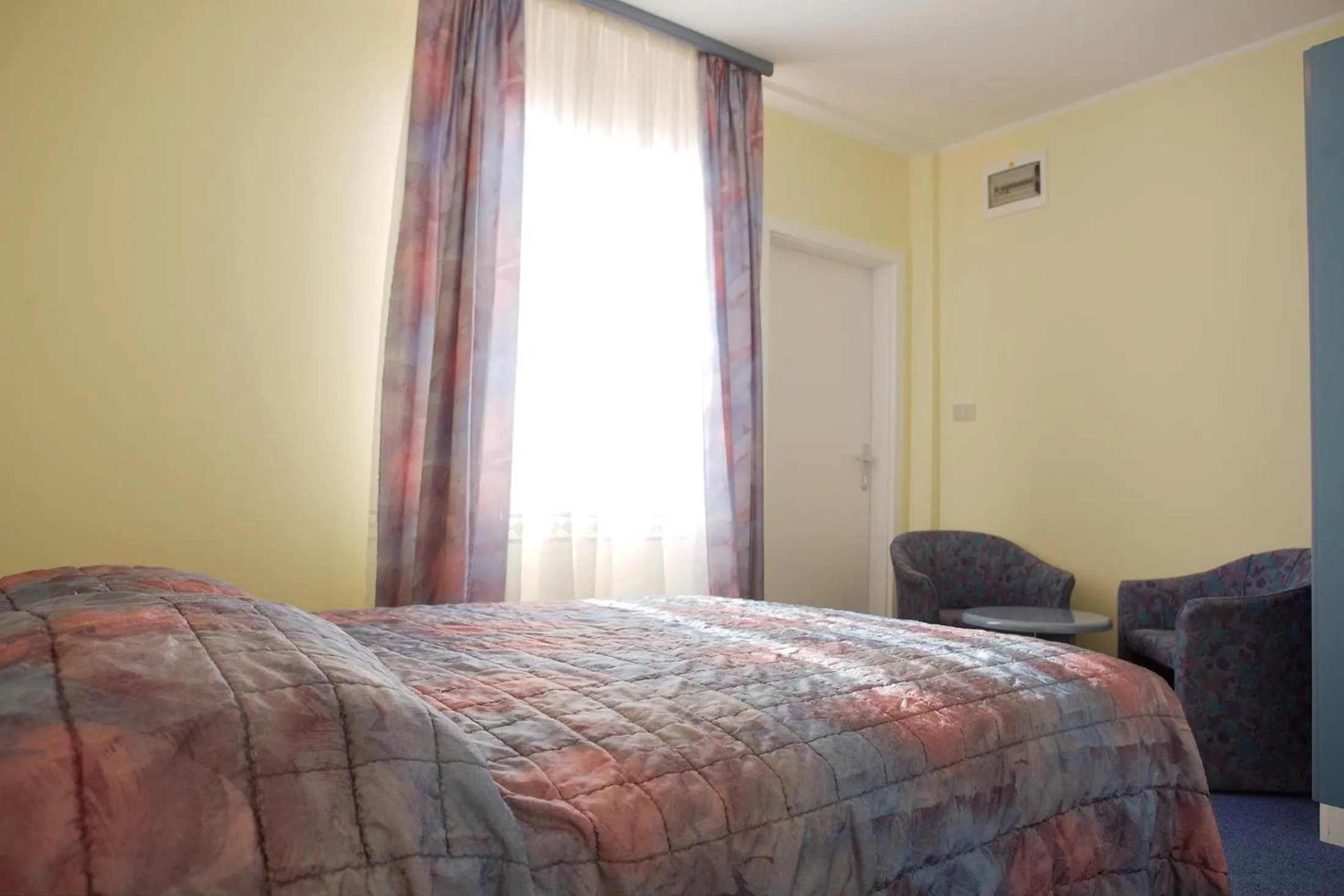 Bed in Garni Hotel Siesta