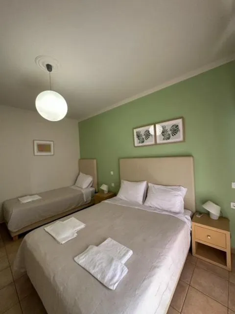 Bed in Antonia Apartments