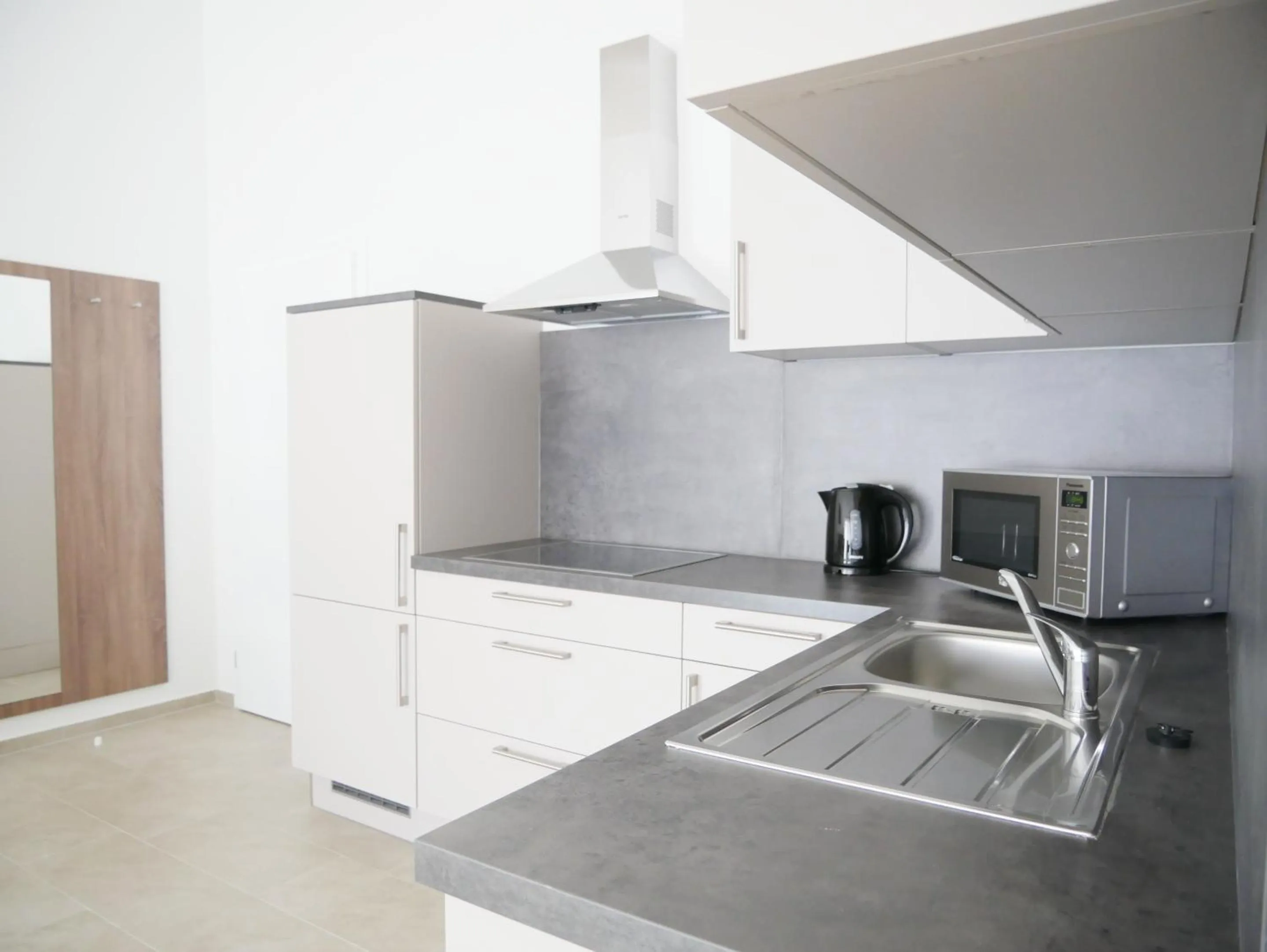 Kitchen or kitchenette in Hotel & Mühlenapartments