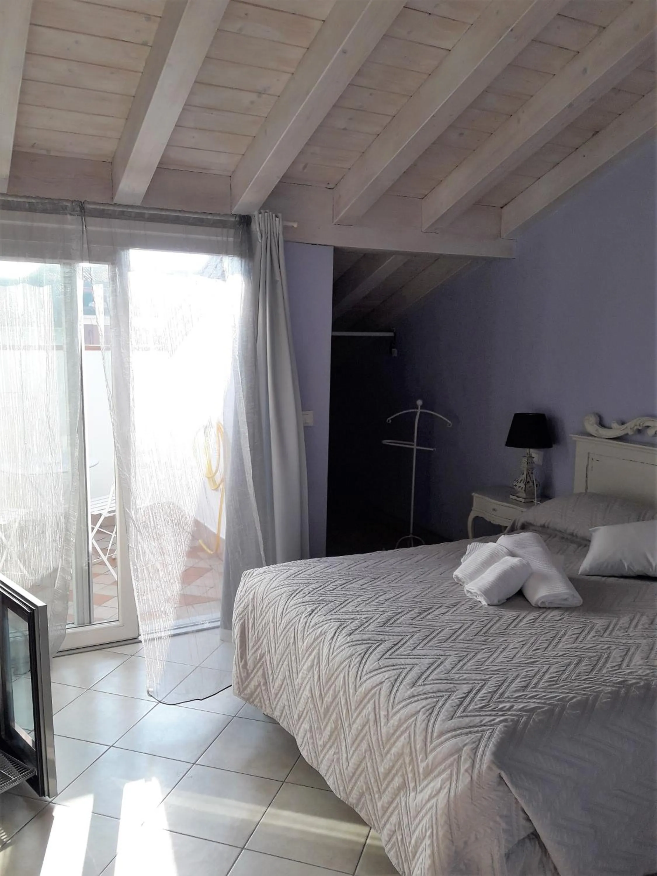 Bedroom, Bed in Le Rêve - Lake view rooms