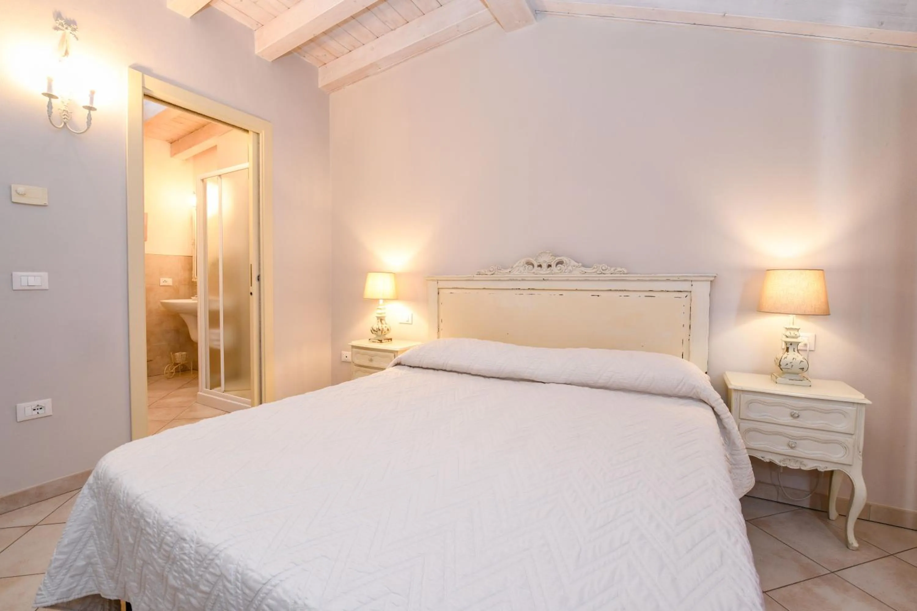 Bed in Le Rêve - Lake view rooms