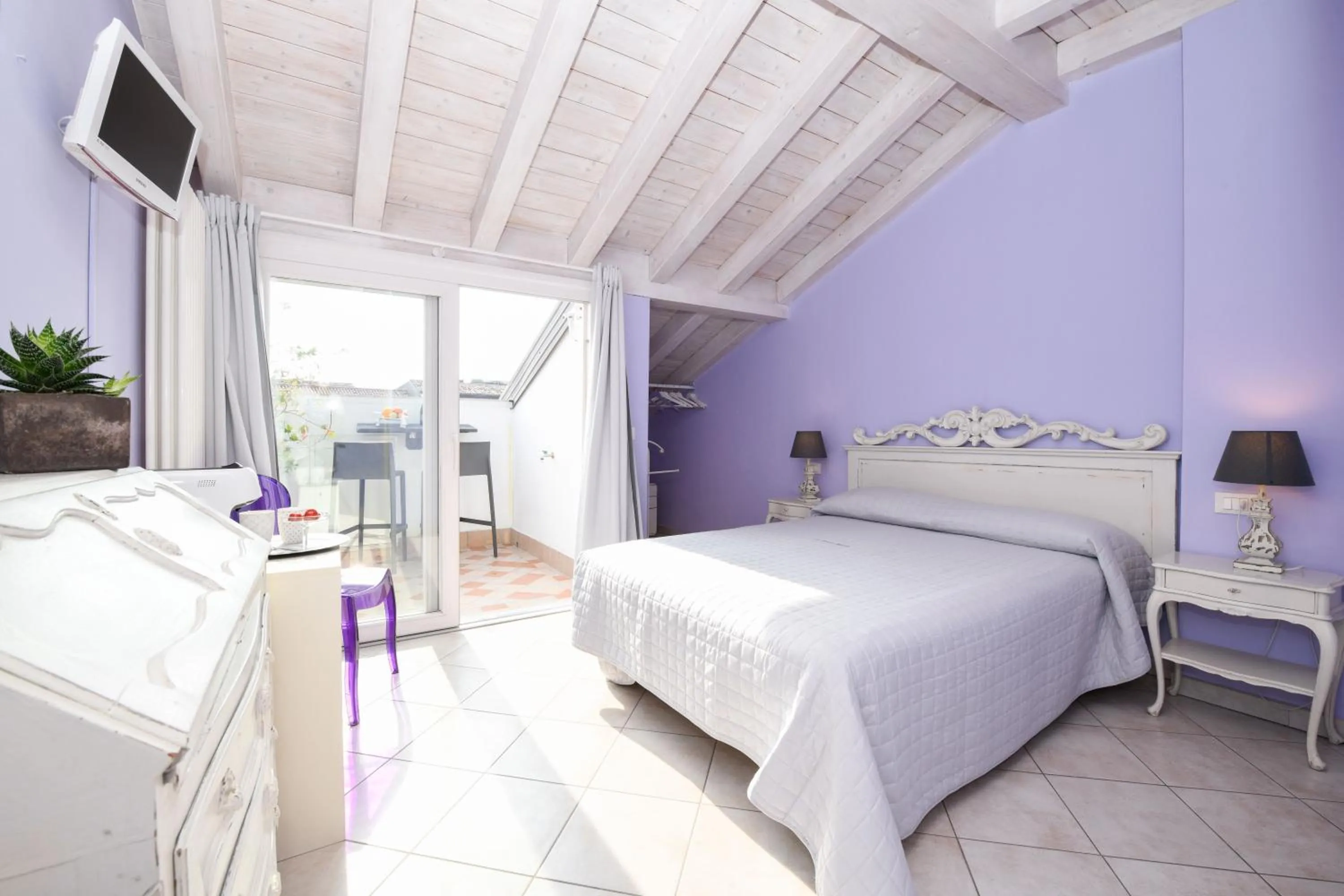 Bed in Le Rêve - Lake view rooms