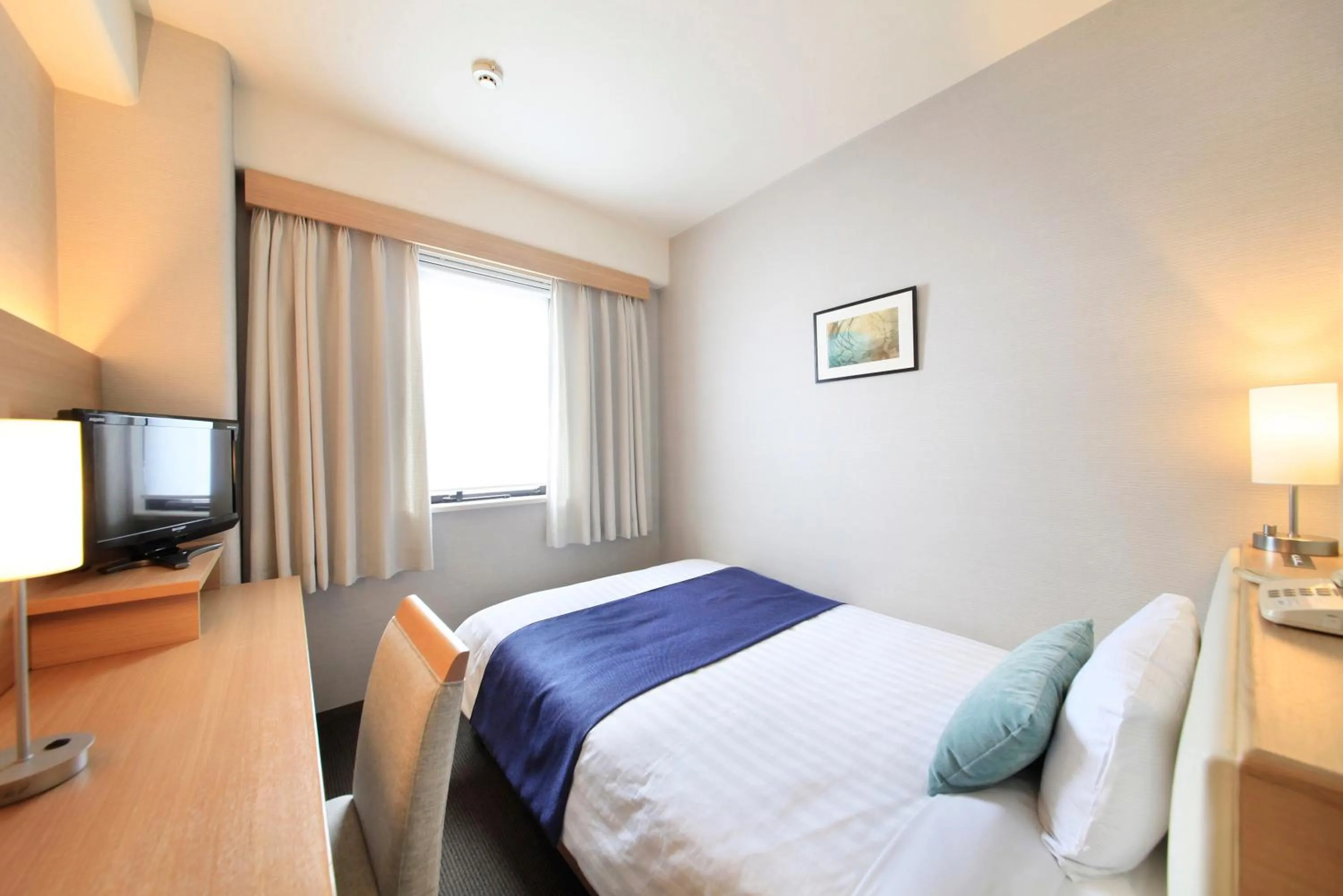 Bed in Shonandai Daiichi Hotel Fujisawa Yokohama