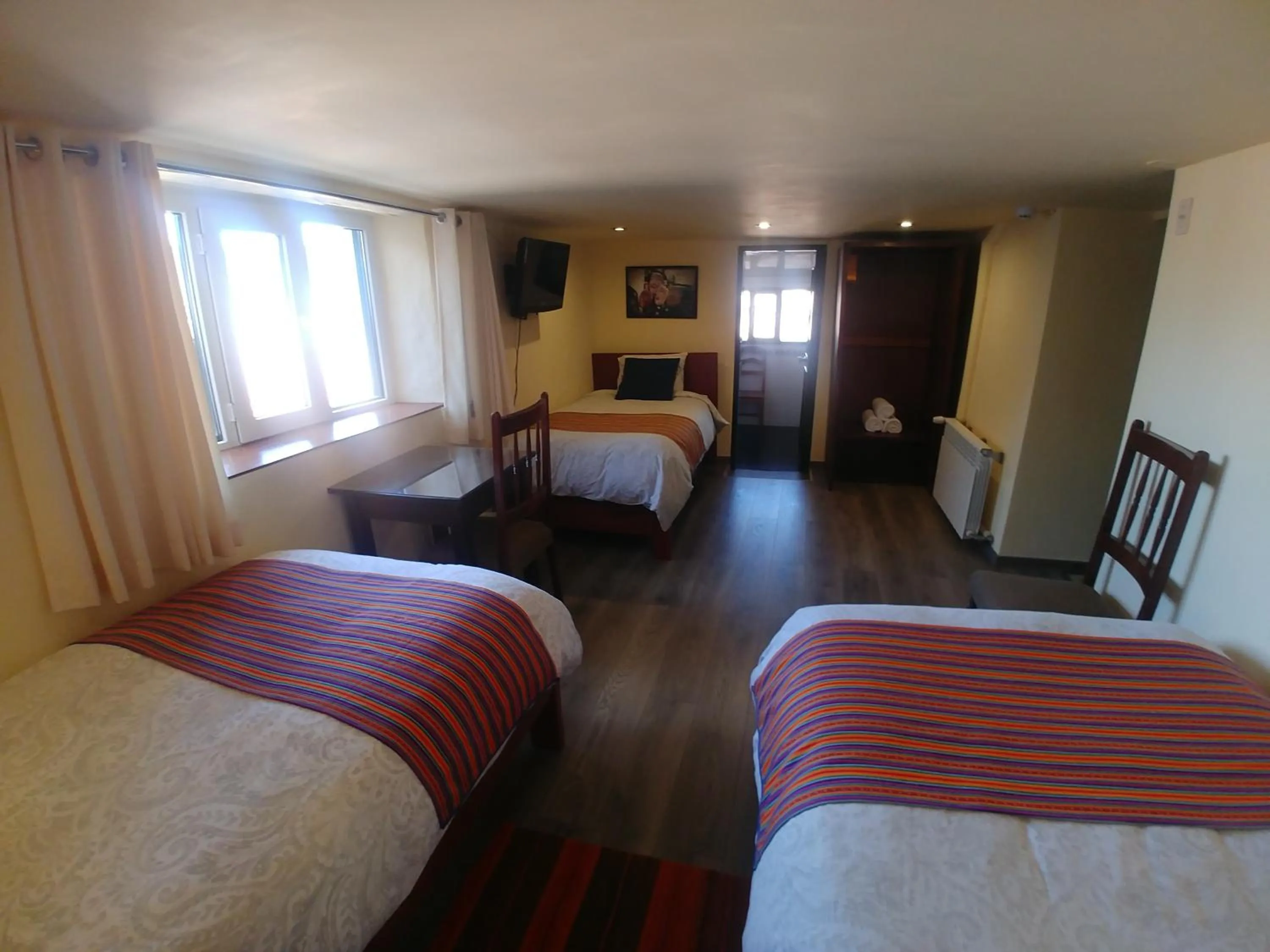 Photo of the whole room, Bed in Hostal Corihuasi