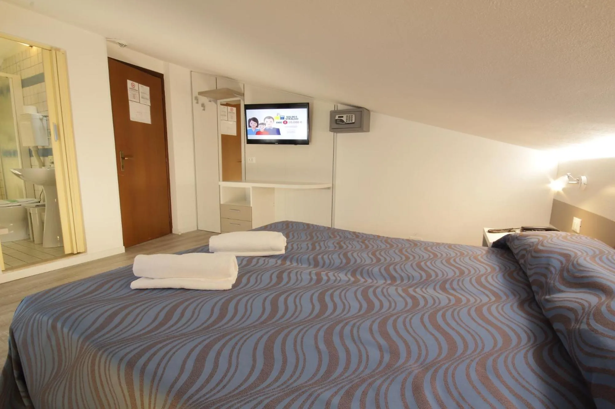 Bed in Hotel Serenella