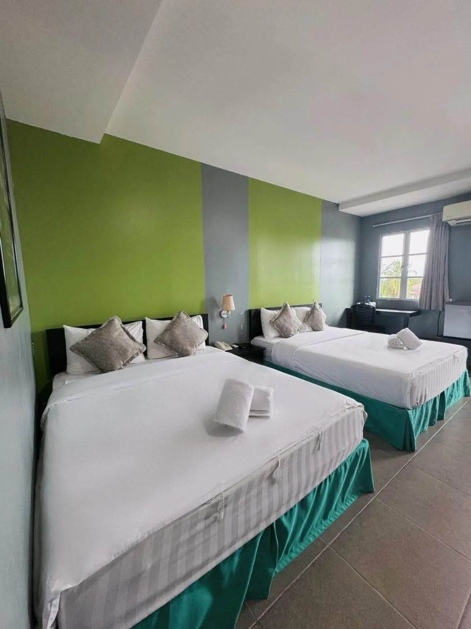 Bed in Metroinn Hotel