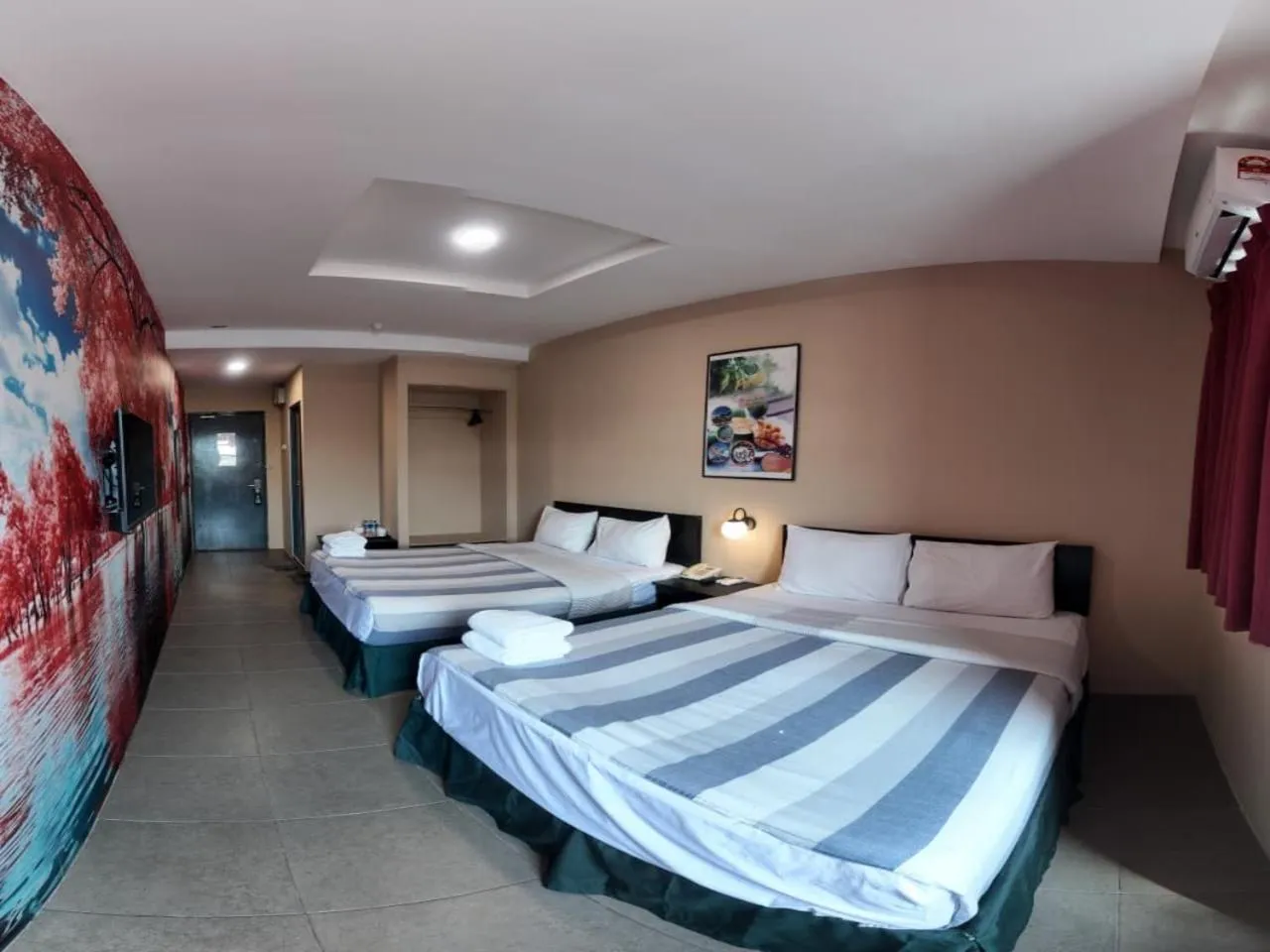 Bed in Metroinn Hotel