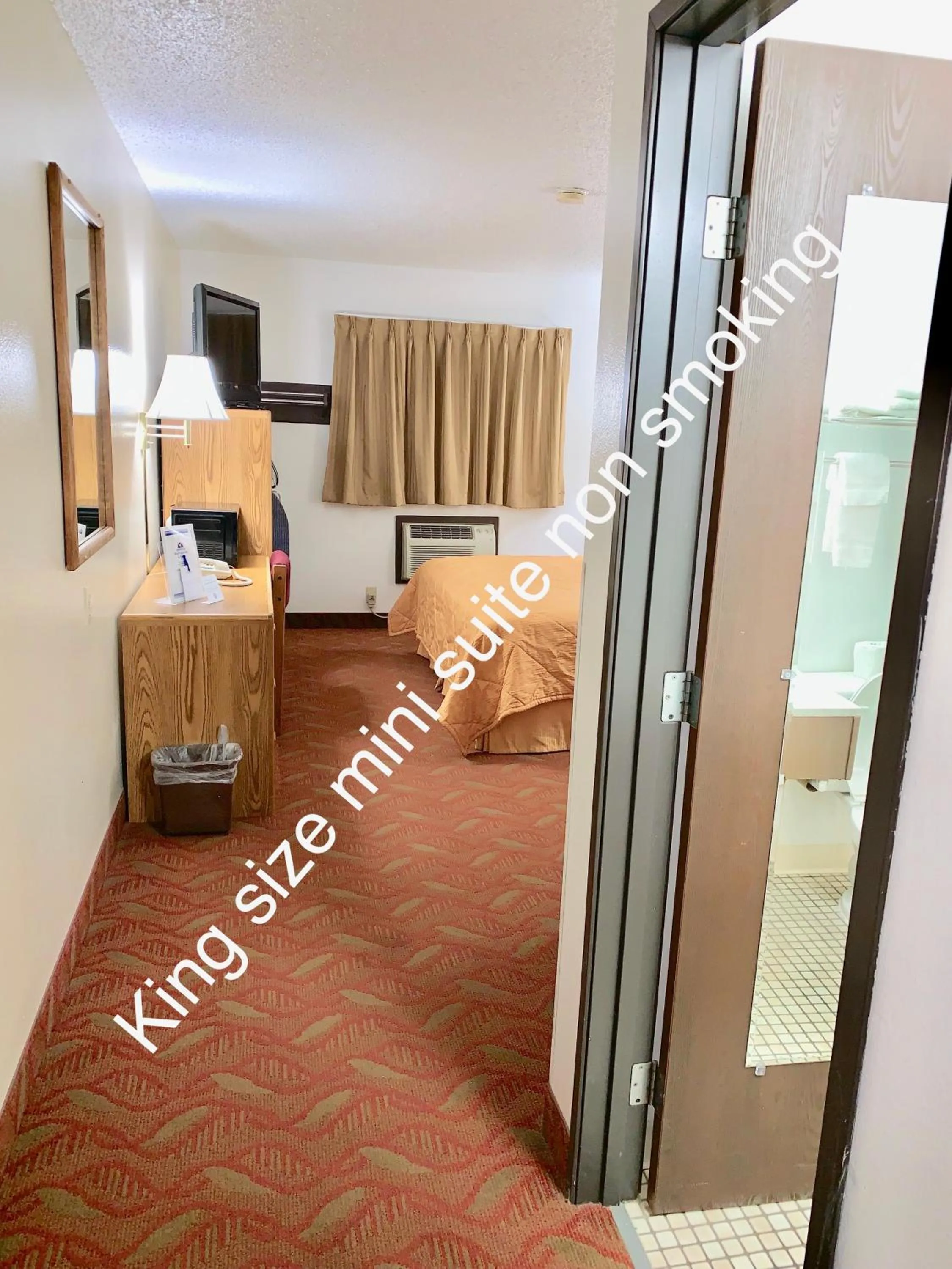 Bed in Americas Best Value Inn and Suites Sidney