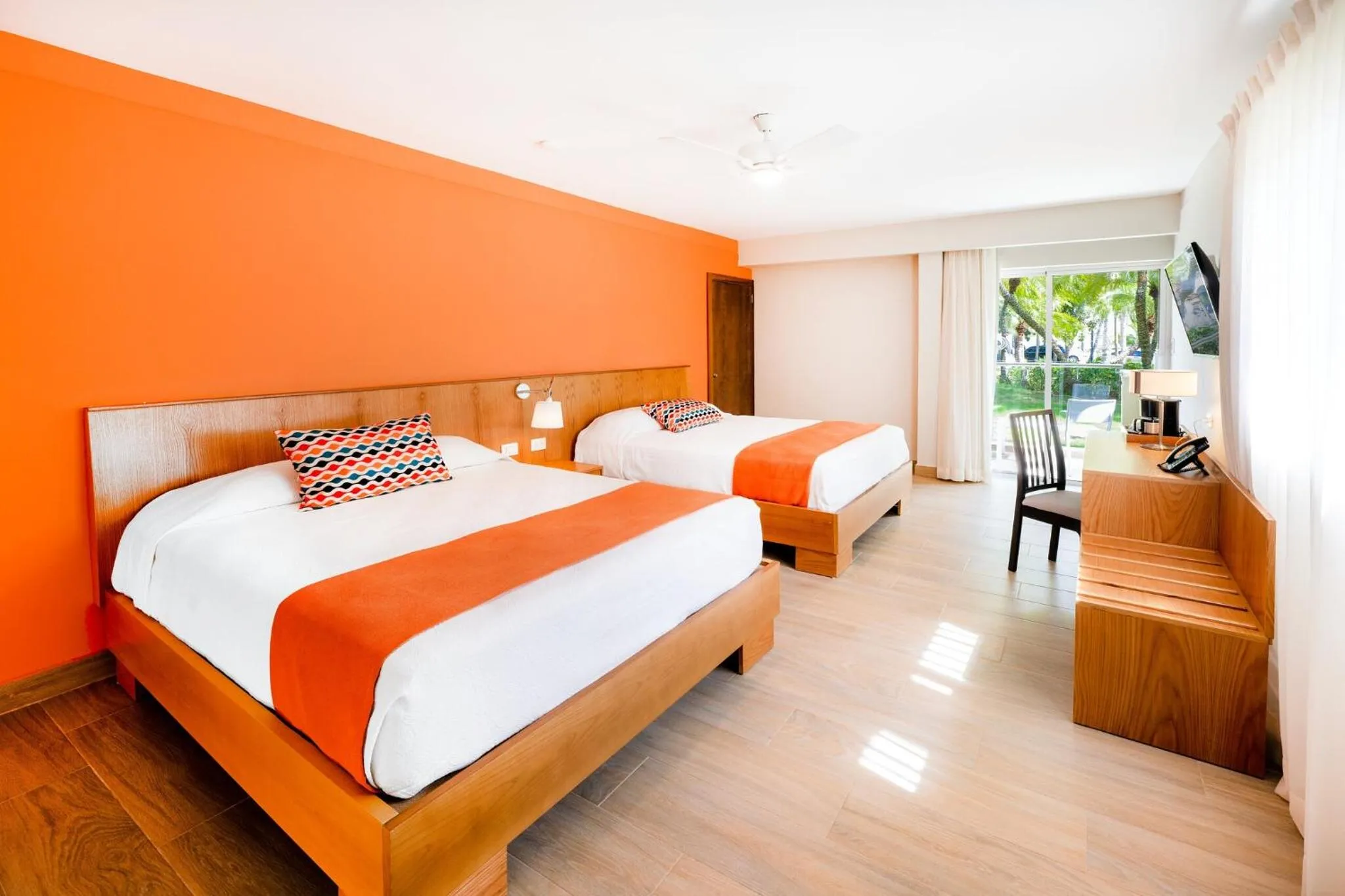 Bed in Coral Costa Caribe Beach Resort - All Inclusive
