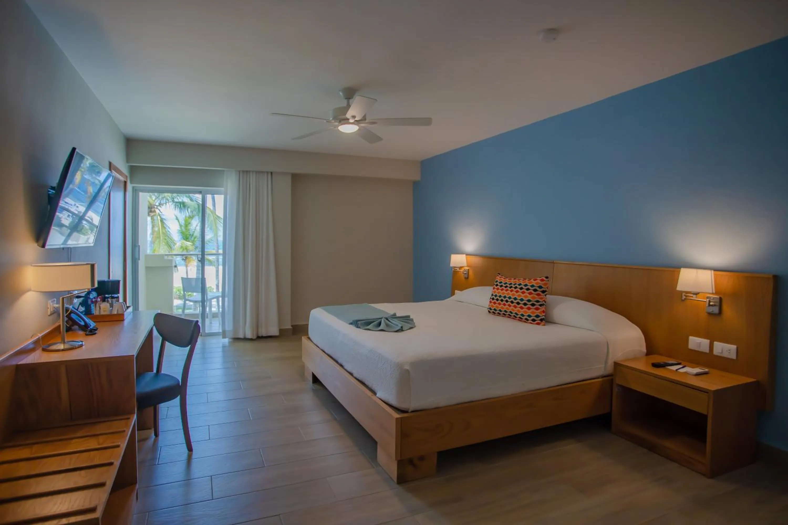 Bed in Coral Costa Caribe Beach Resort - All Inclusive