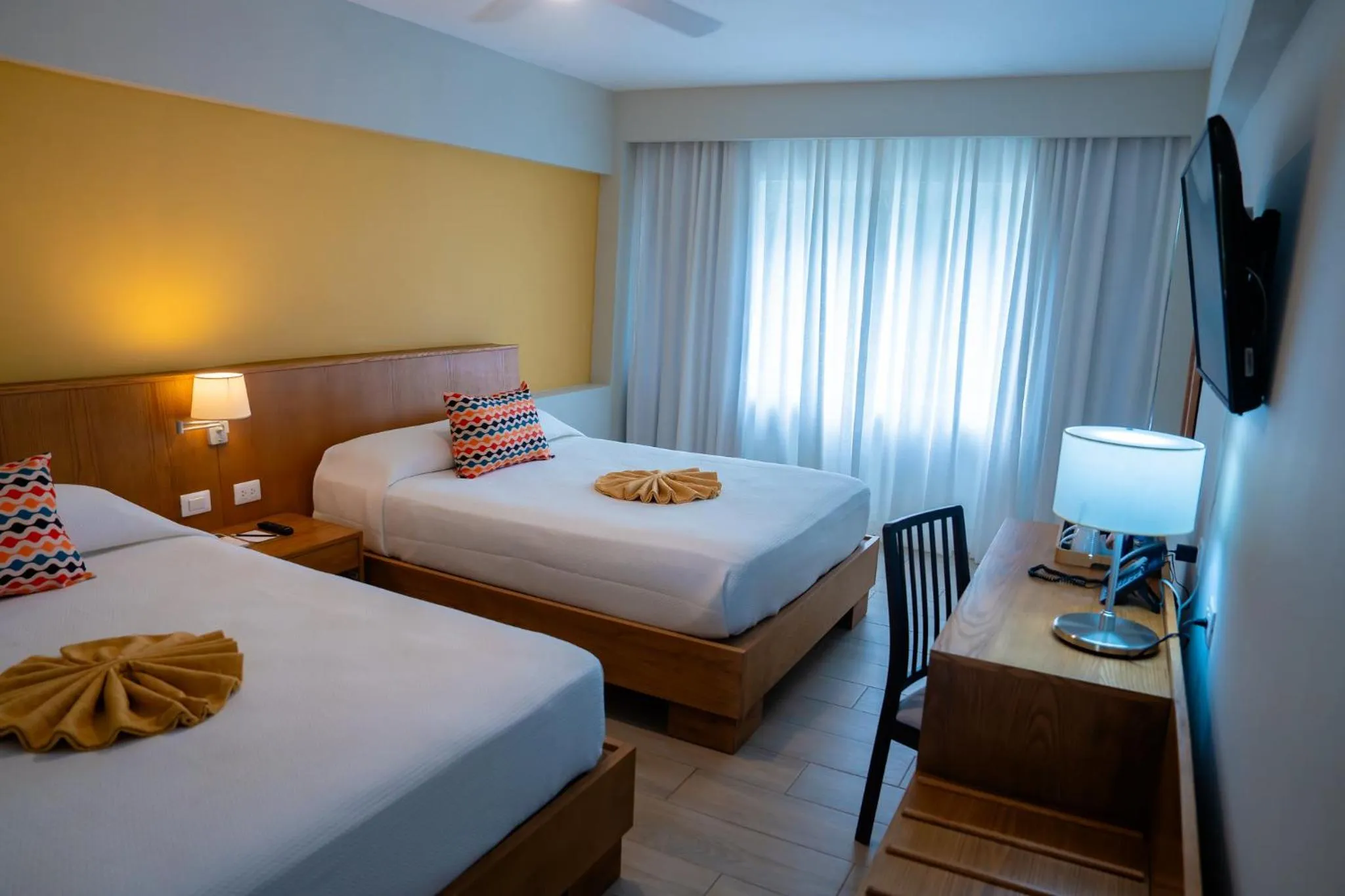 Bedroom, Bed in Coral Costa Caribe Beach Resort - All Inclusive