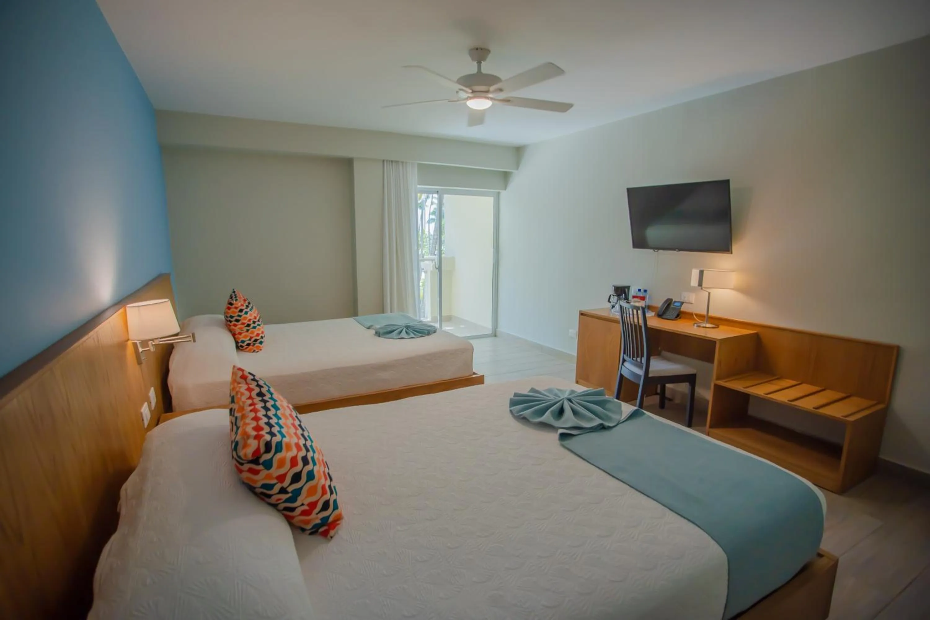 Bed in Coral Costa Caribe Beach Resort - All Inclusive