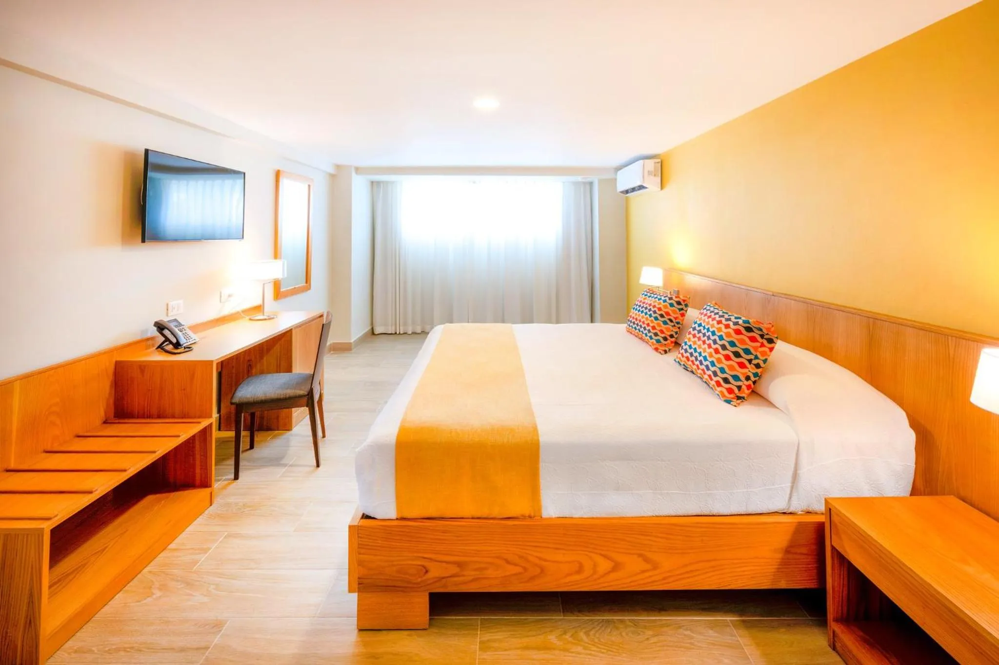 Bed in Coral Costa Caribe Beach Resort - All Inclusive