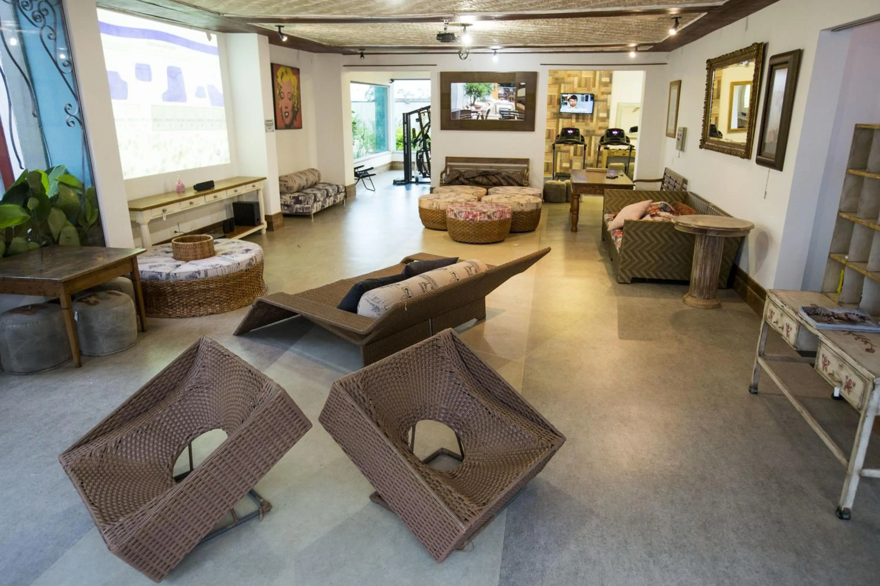 Communal lounge/ TV room, Bed in Pousada Pequena Tiradentes