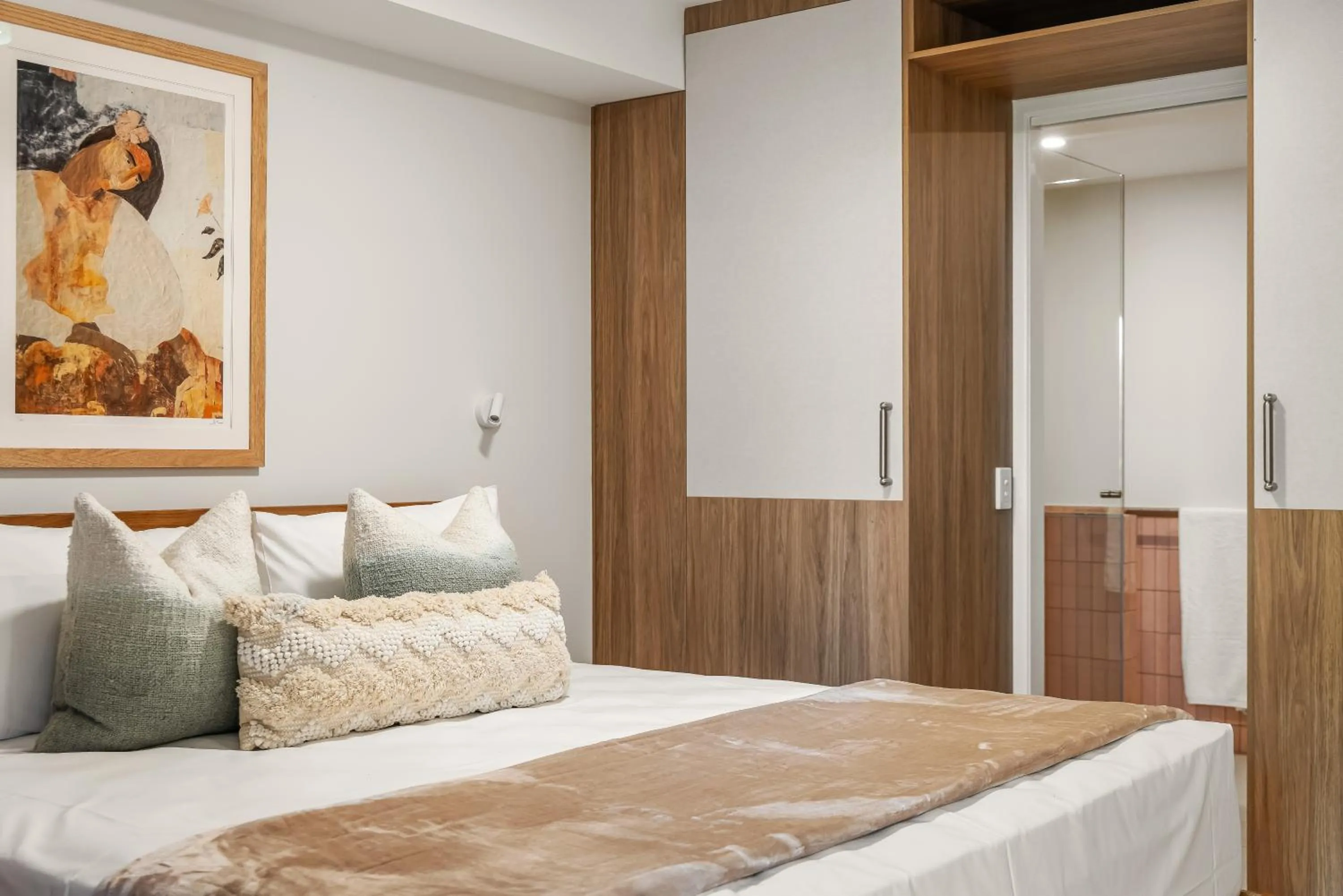 Bed in Noosa Outrigger Beach Resort