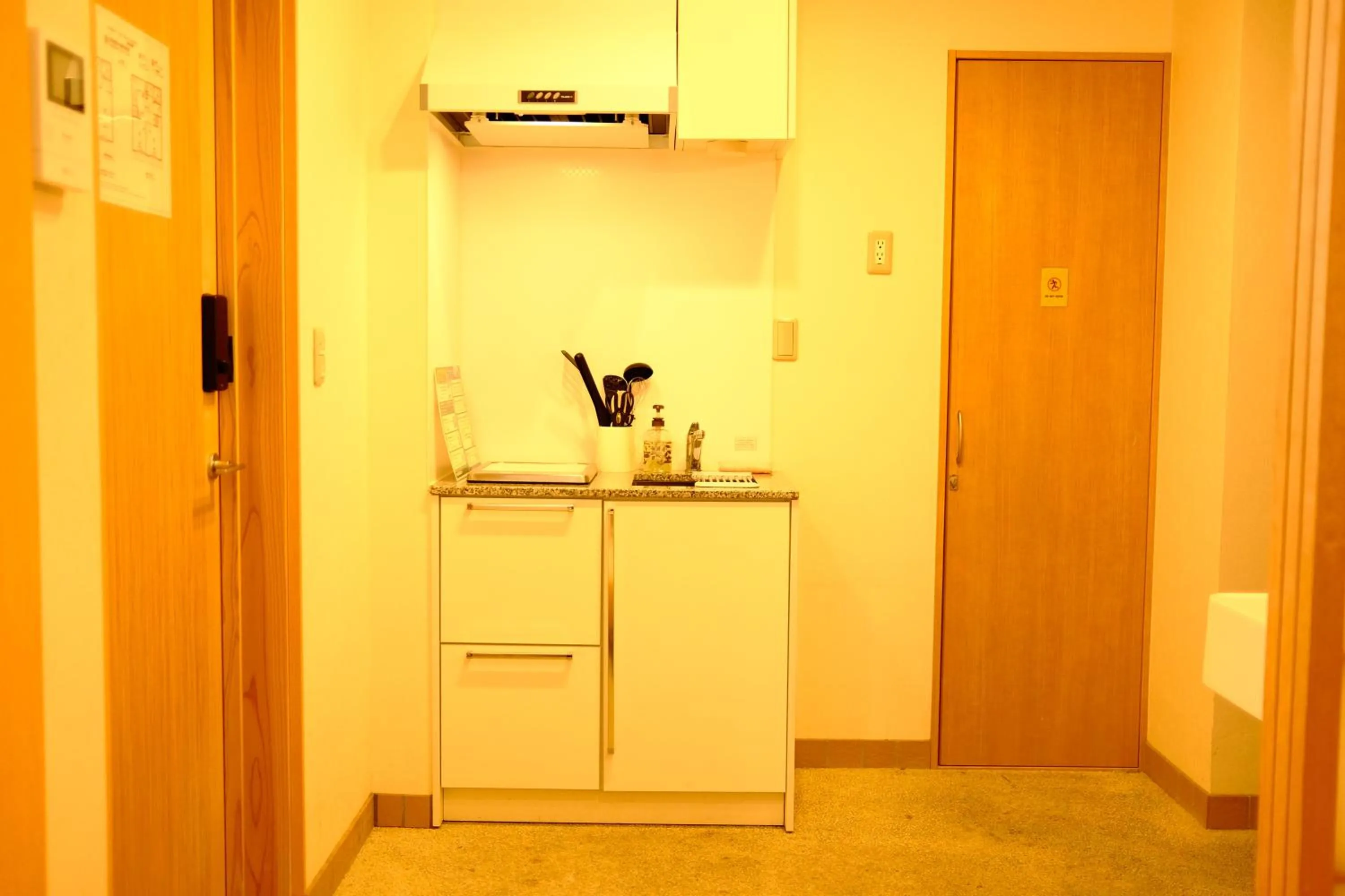 Kitchen or kitchenette in Kamon Inn Hieijocho