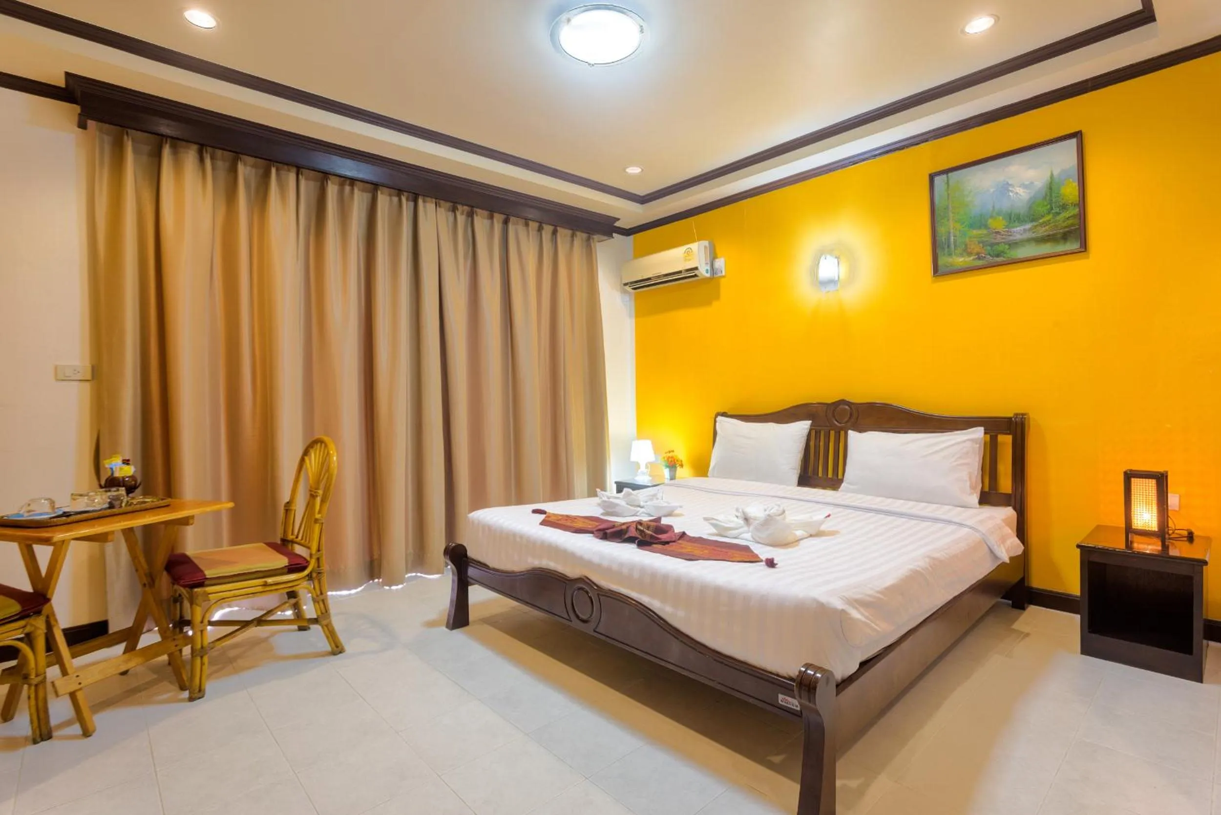 Balcony/Terrace, Bed in Grand Orchid Inn Patong beach