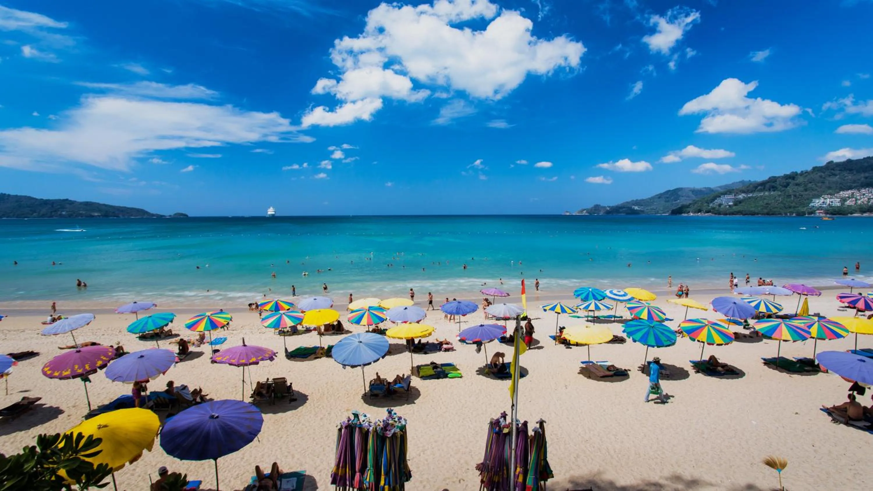 People in Grand Orchid Inn Patong beach