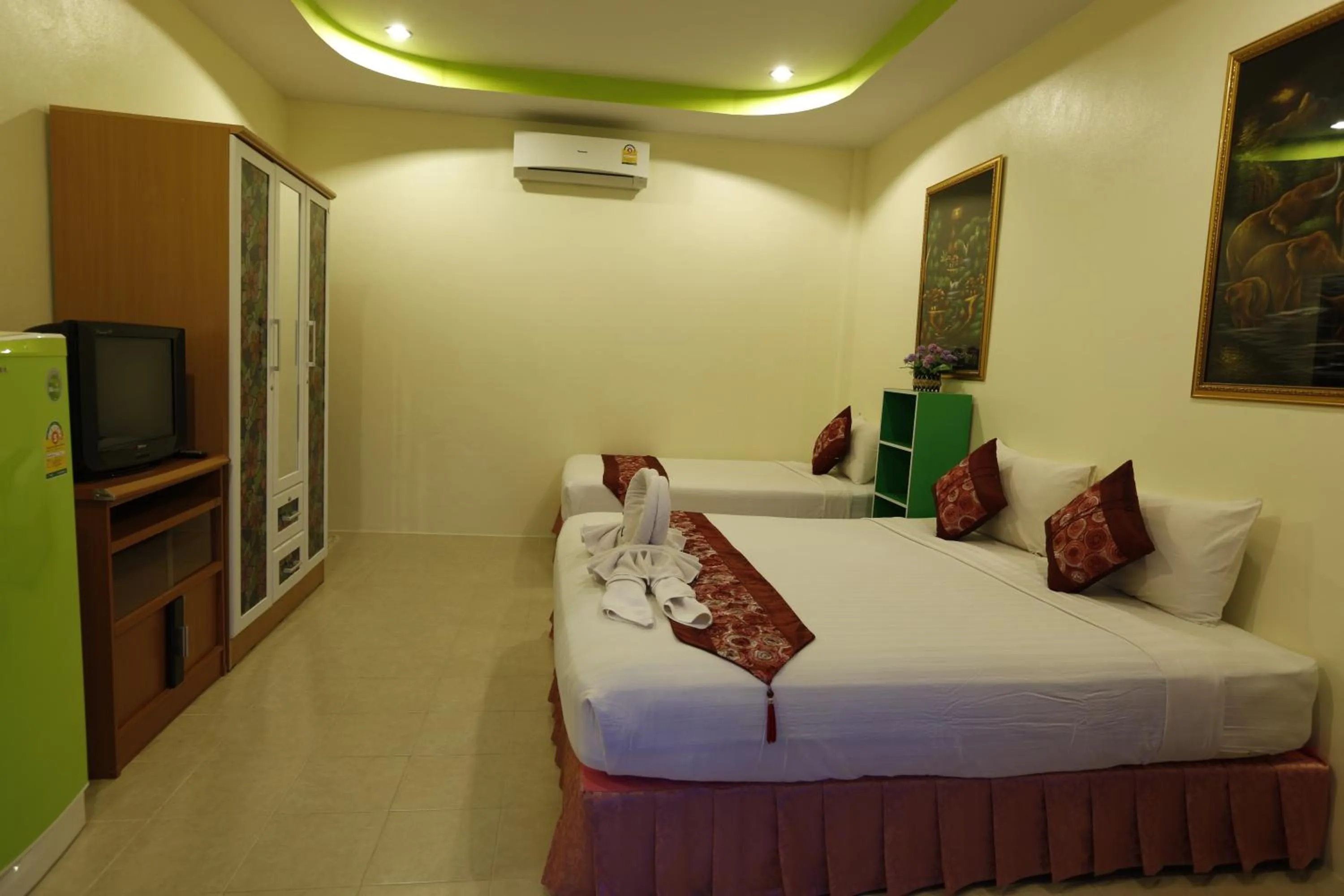 Bed in Rung Arun Resort