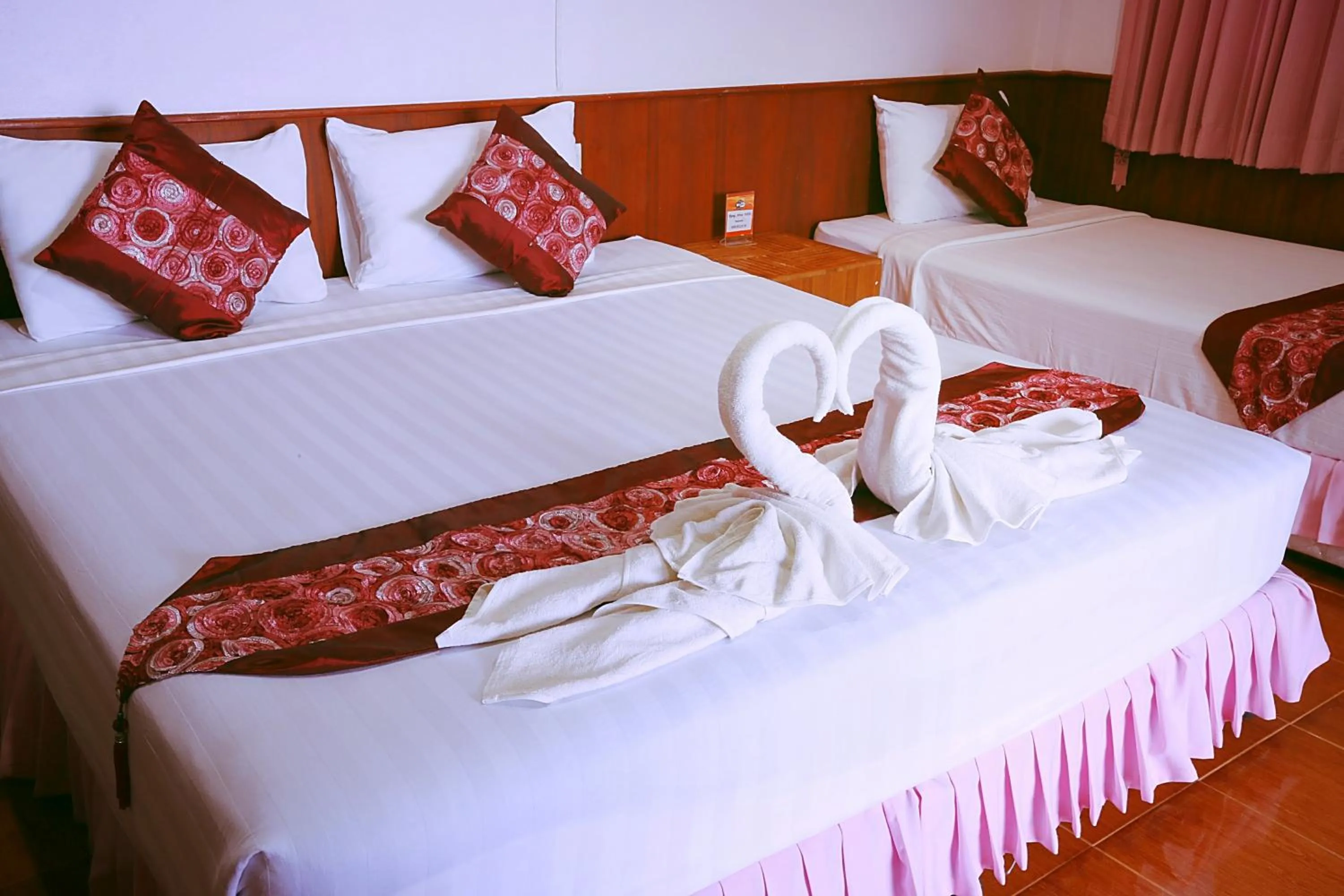 Bed in Rung Arun Resort