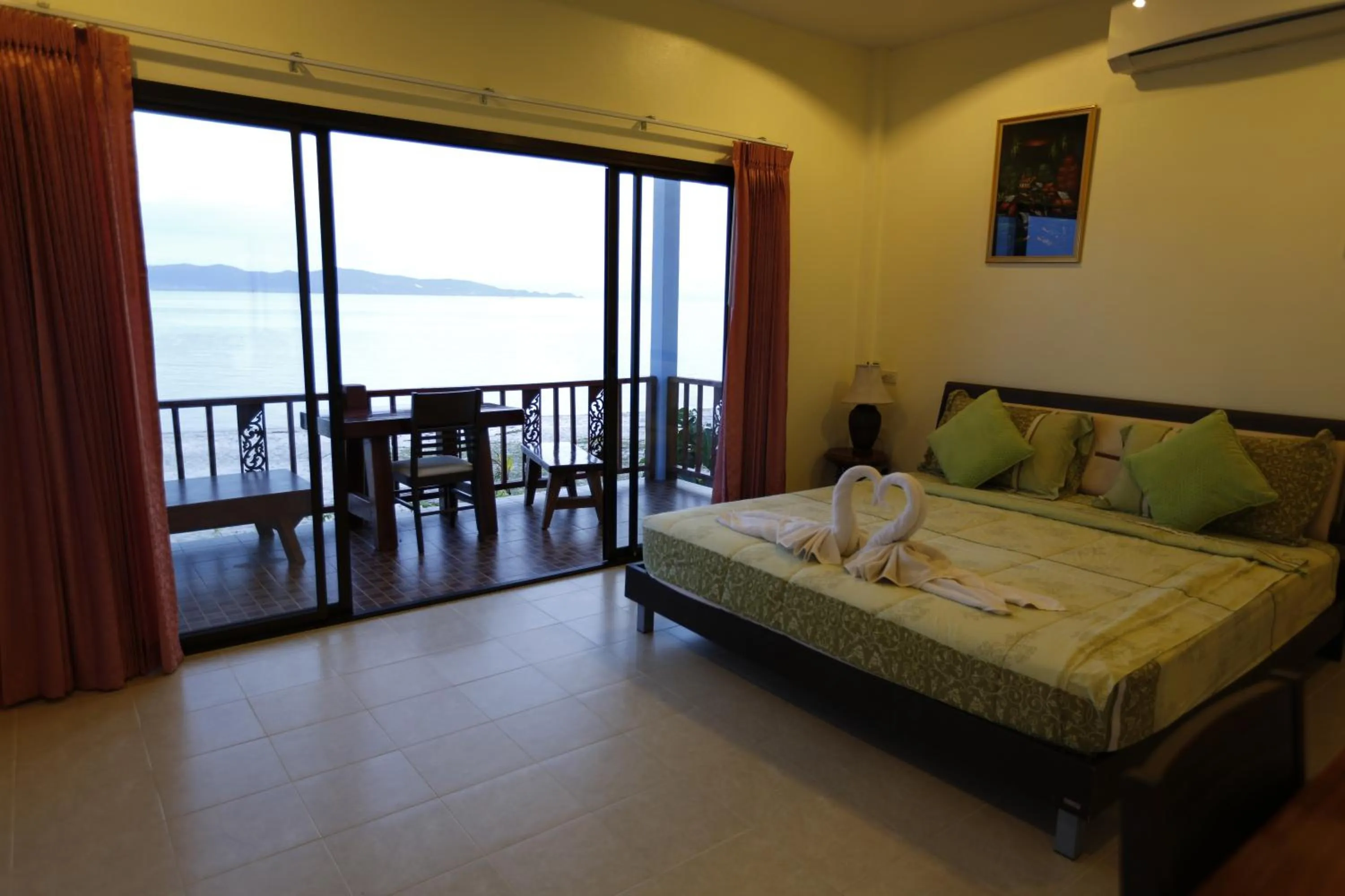 Balcony/Terrace, Bed in Rung Arun Resort
