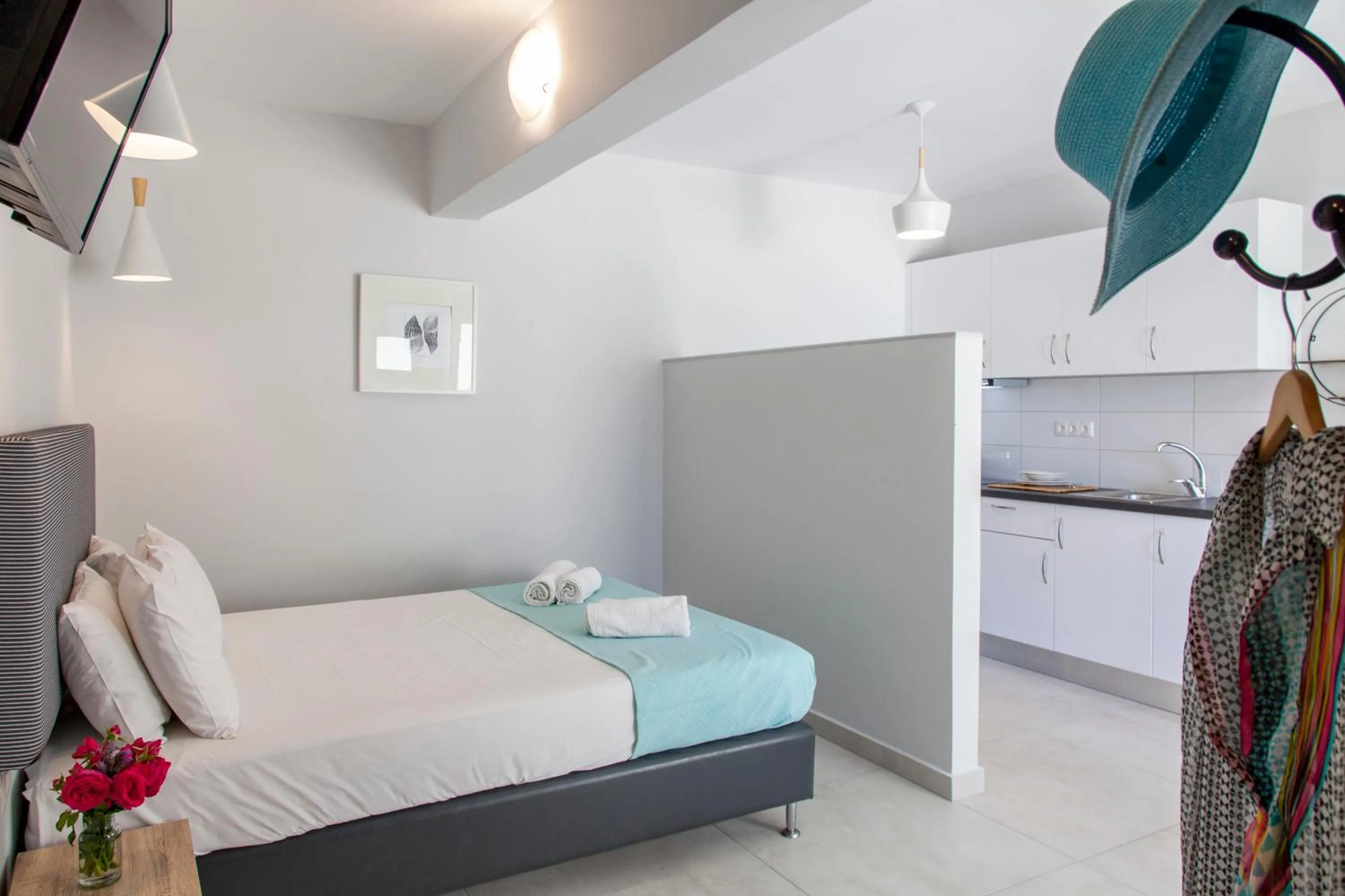 Kitchen or kitchenette, Bed in Agni Suites