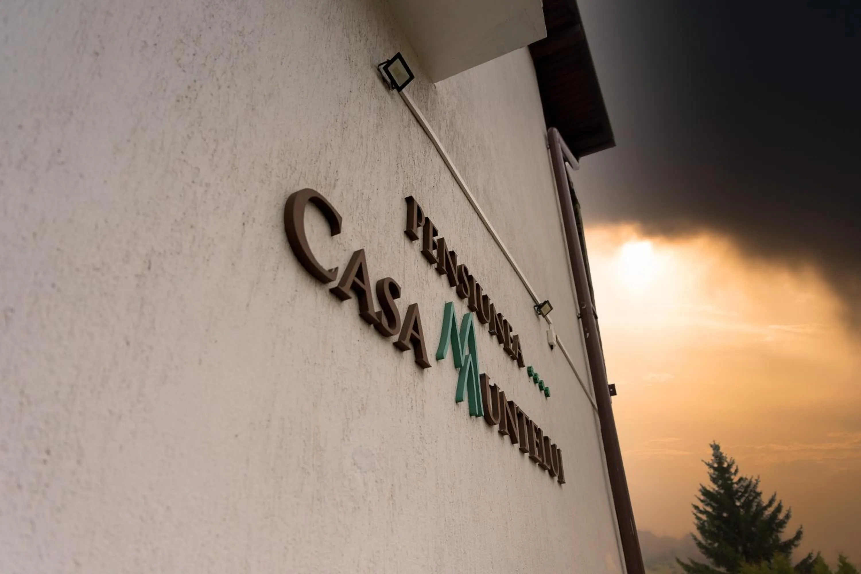 Property logo or sign in Casa Muntelui