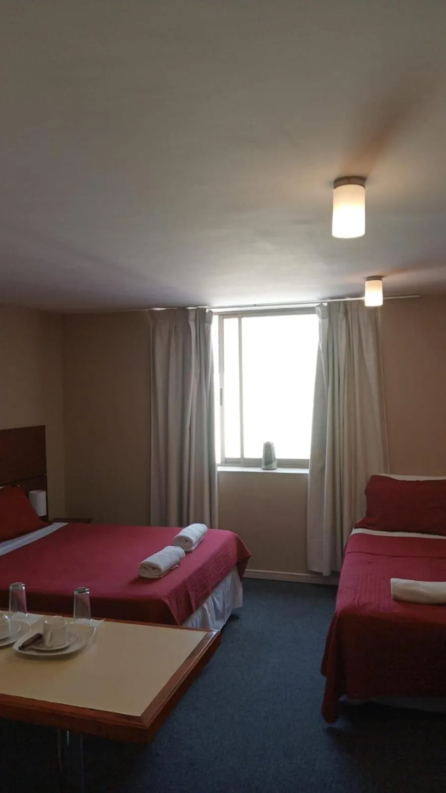 Bed in Origen Apart-Hotel