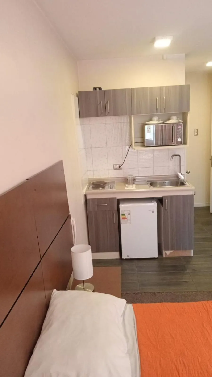 Bed in Origen Apart-Hotel