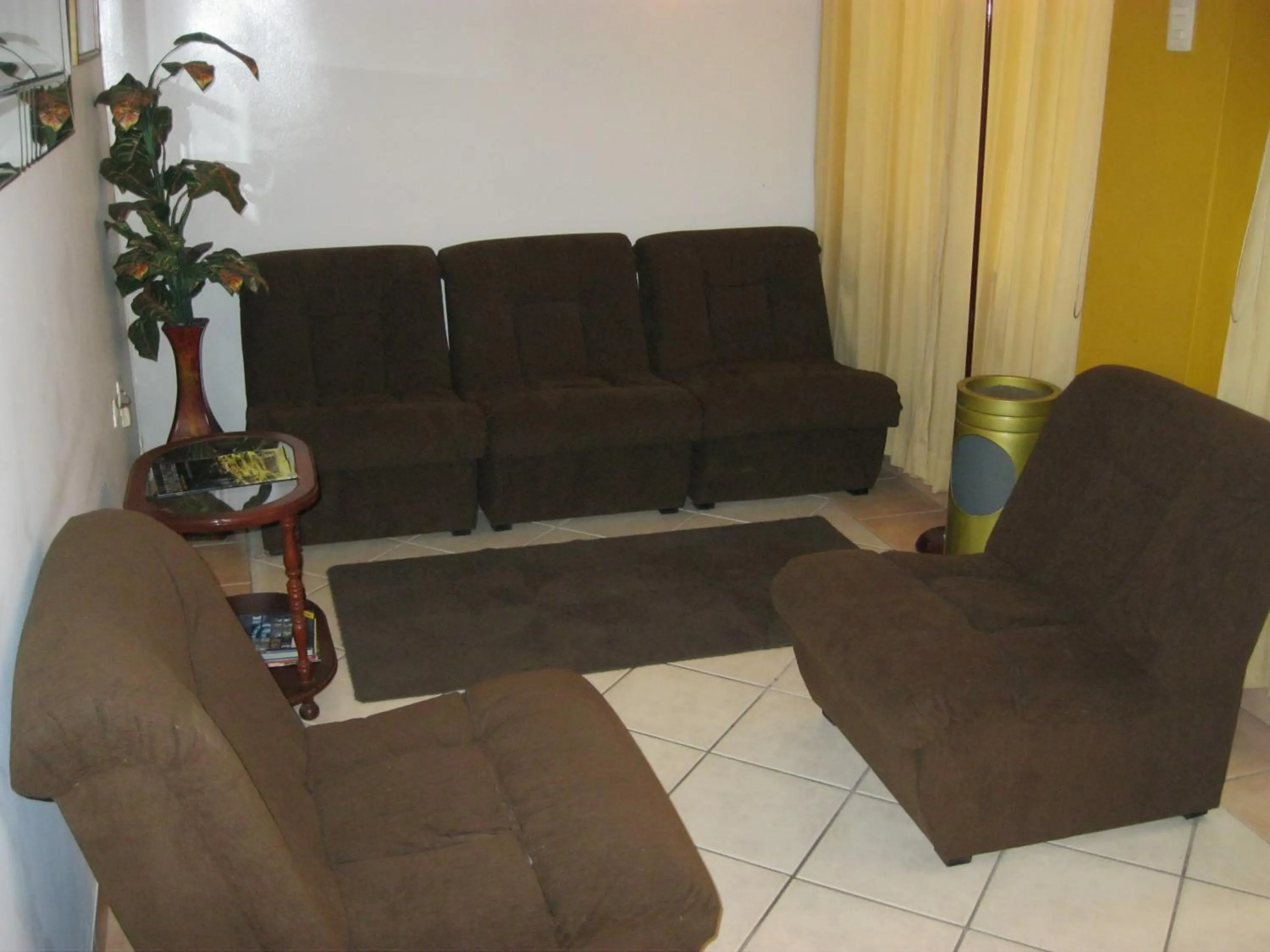 Living room in Hotel Suite Plaza