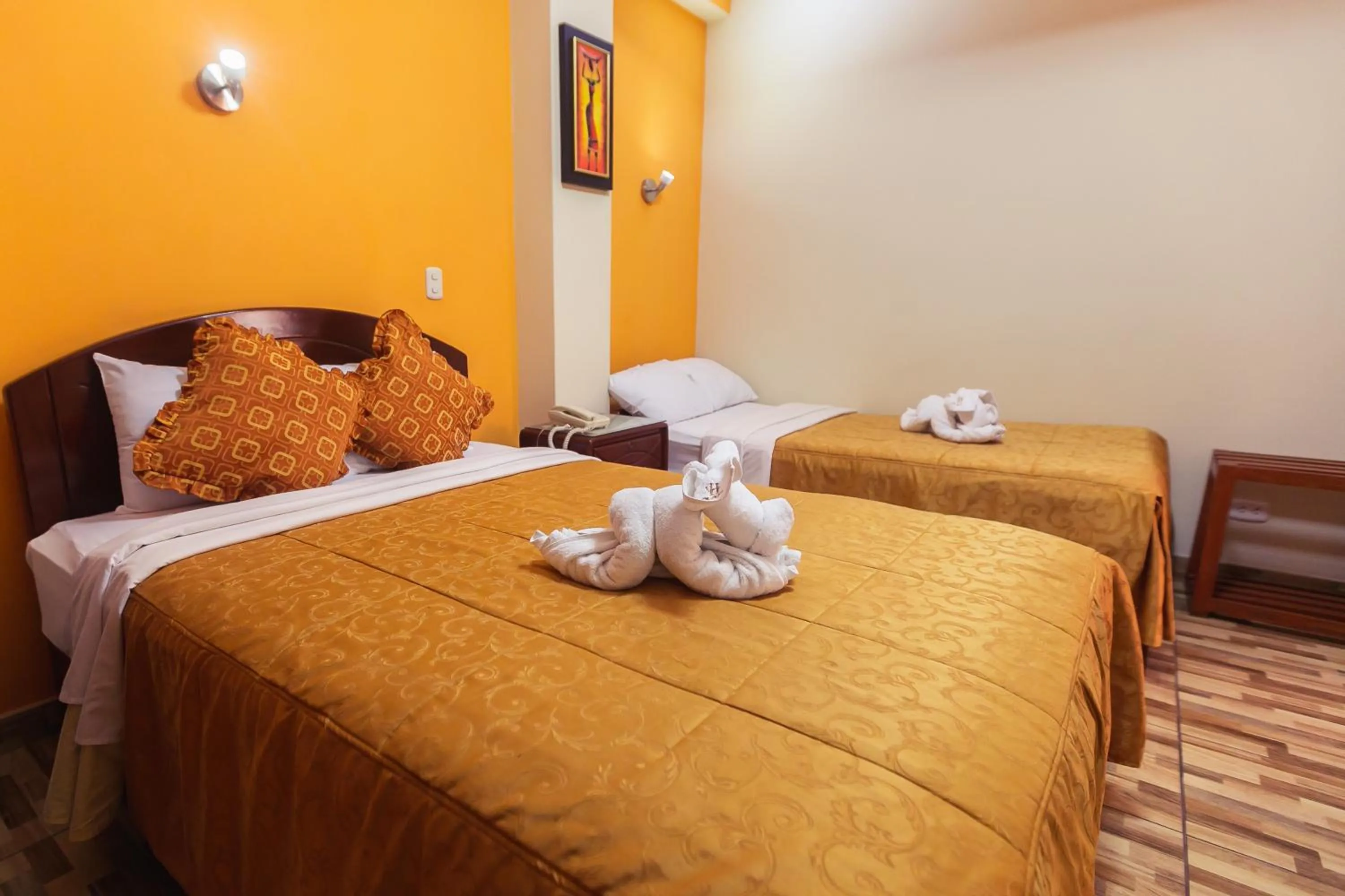 Bed in Hotel Suite Plaza